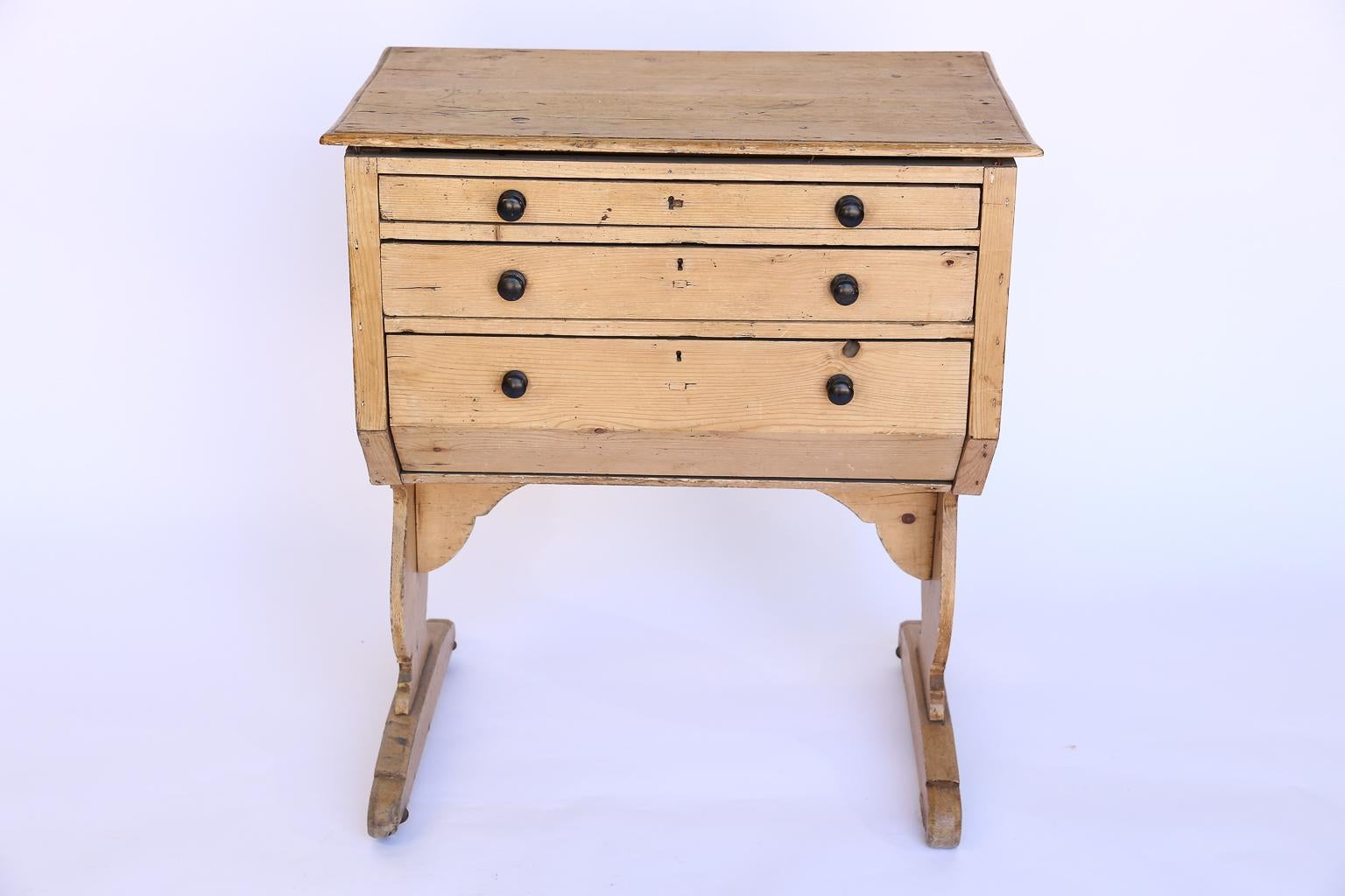Found in France, this vintage sewing table would look great in a bedroom, powder room or hallway. It has several storage drawers and a nice top surface which could be used for displaying decorative items. Each of the three drawers have several built