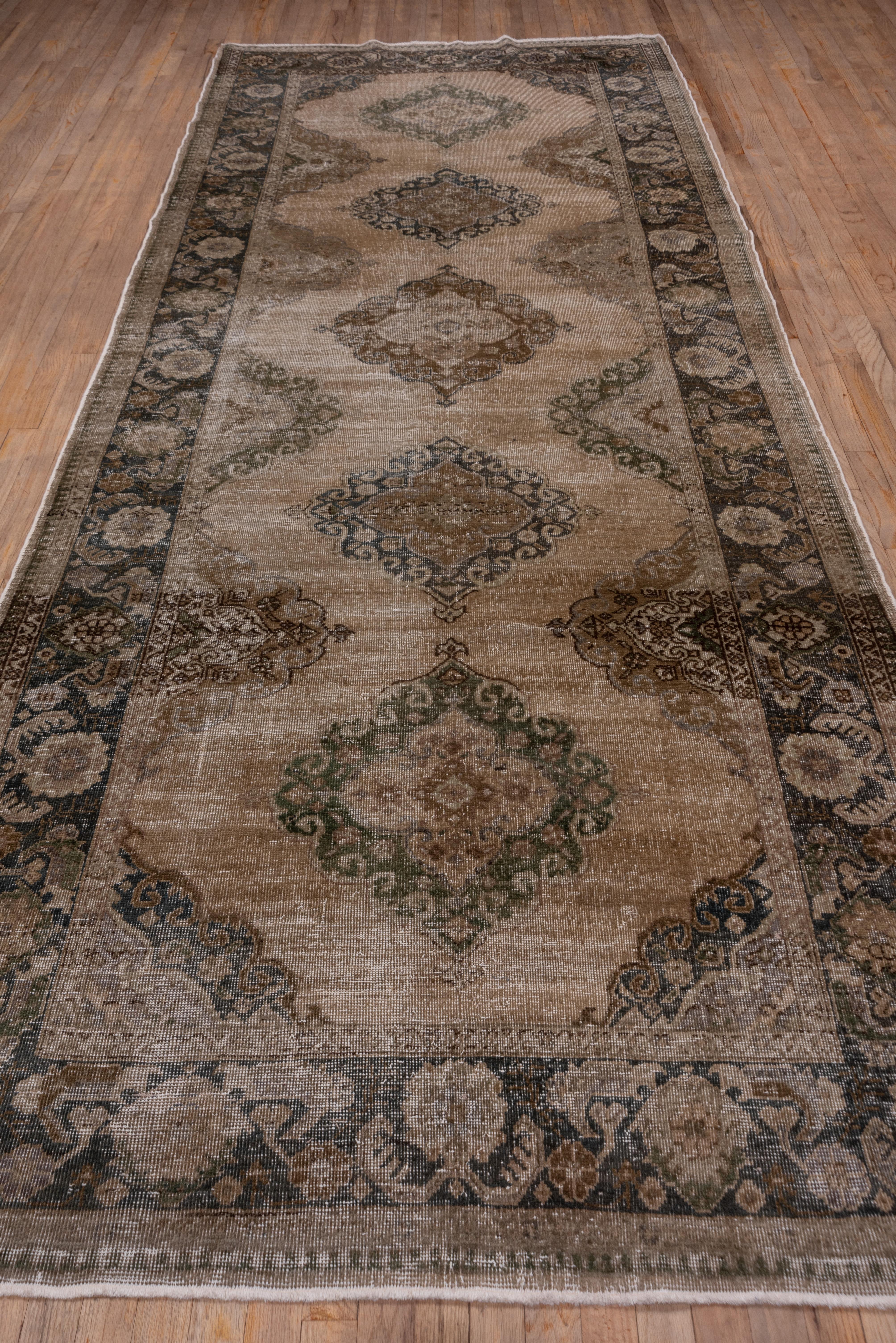 Vintage Shabby Chic Turkish Oushak Gallery Carpet, Earth Tones, Green Borders In Good Condition For Sale In New York, NY
