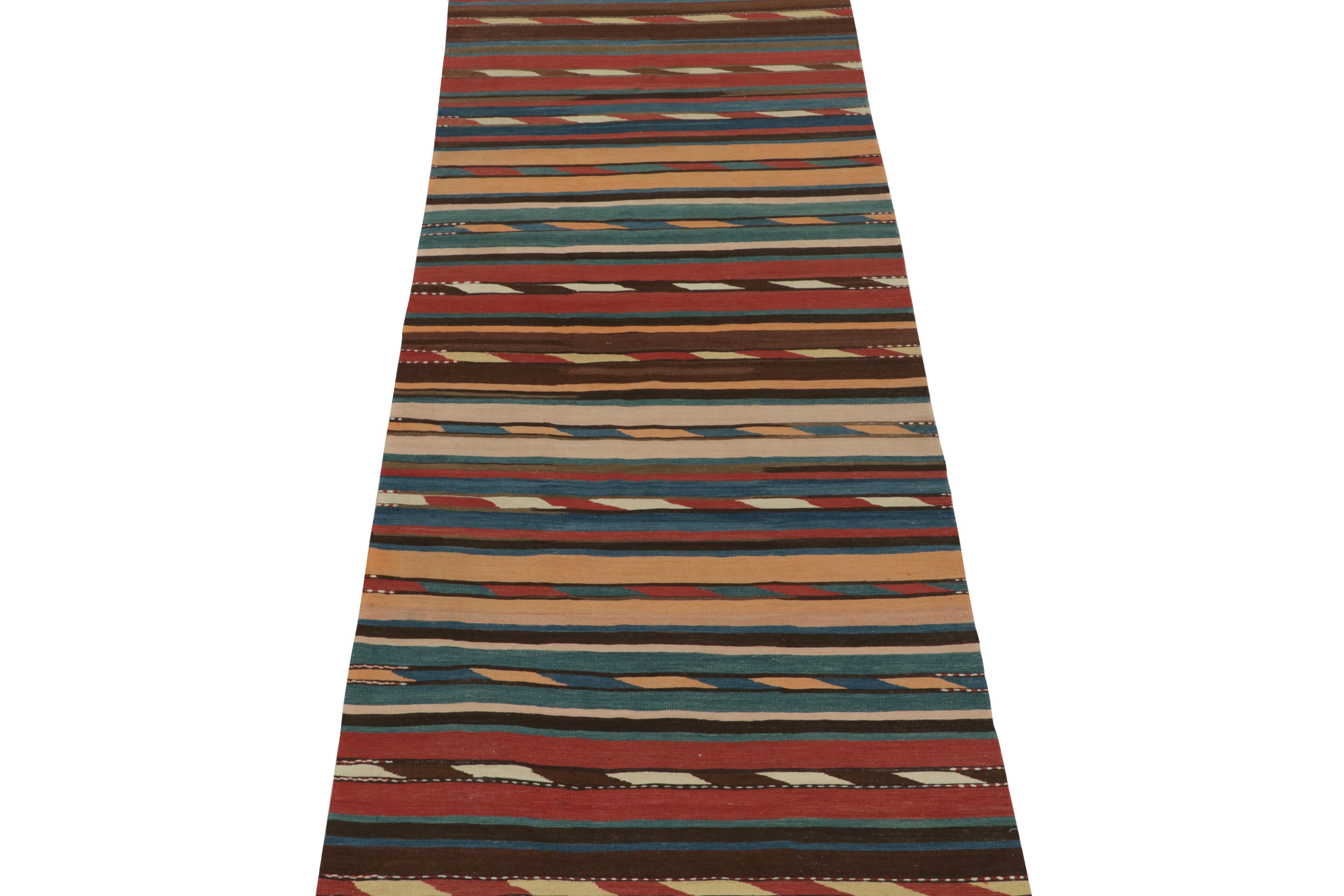 This vintage 4x10 Persian kilim is a unique tribal rug for its period and provenance. Handwoven in wool, it’s believed to be of Shahsavan provenance and originates circa 1950-1960.

Further on the Design:

The field hosts horizontal stripes