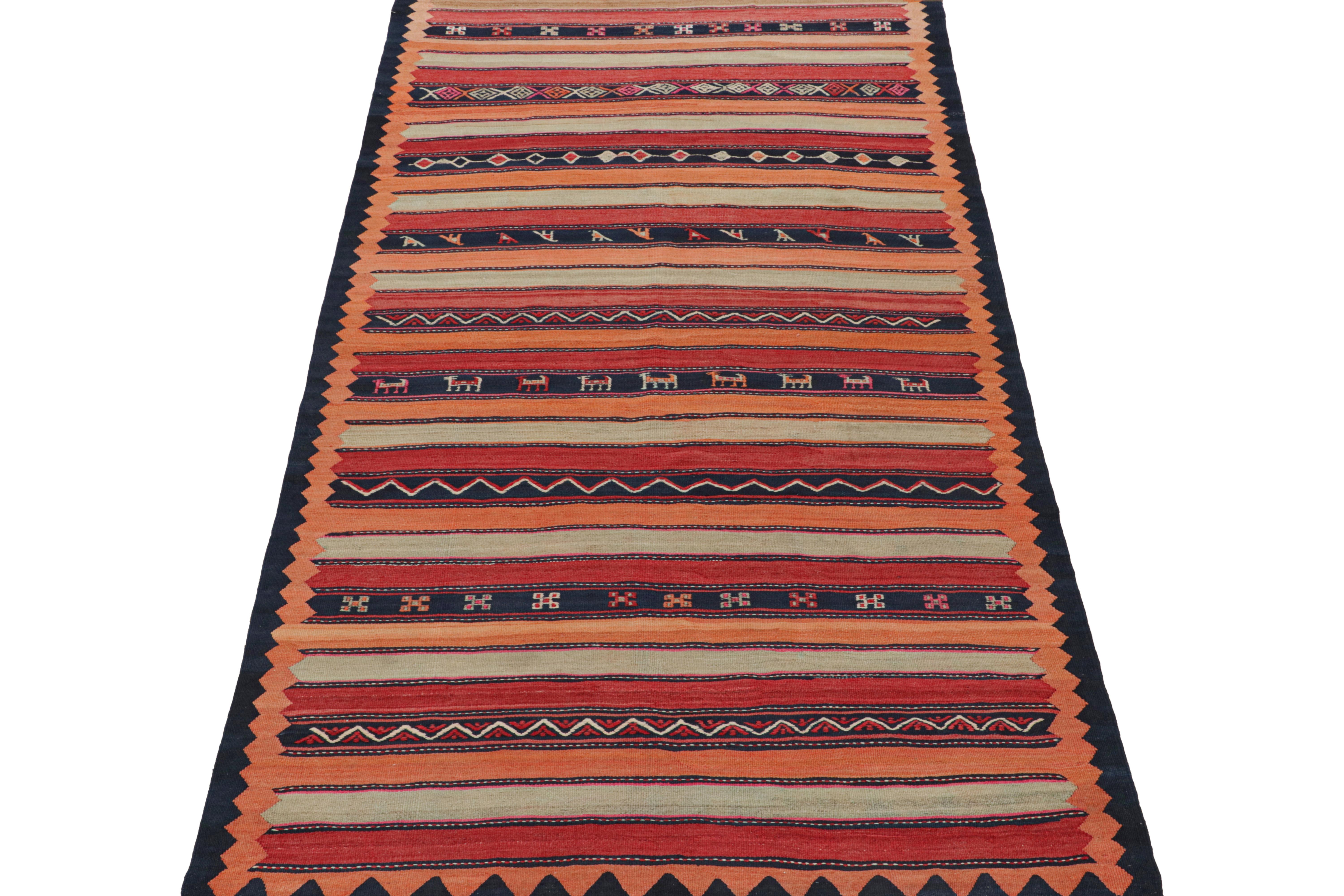 This vintage 5x10 Persian Kilim is believed to be a midcentury Shahsavan tribal rug. Handwoven in wool, it originates circa 1950-1960 and enjoys an interesting striped design. 

On the Design:

The design enjoys warm colors in stripes and