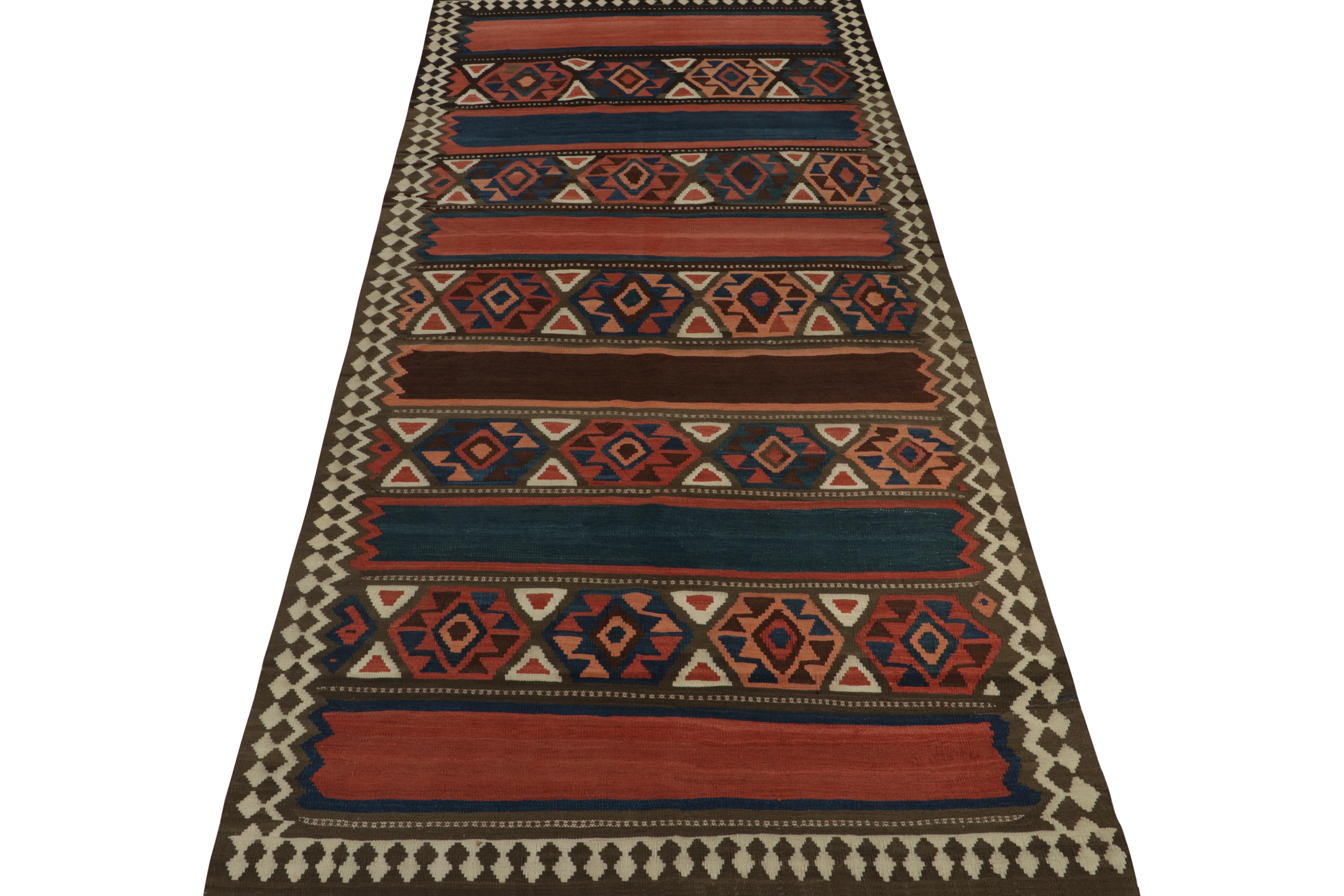 This vintage 6x13 Persian kilim and gallery runner is a mid-century Shahsavan tribal rug—handwoven in wool circa 1950-1960.

Further on the Design:

The design prefers rich brown, brick red, terracotta pink and navy blue in a gorgeous play of