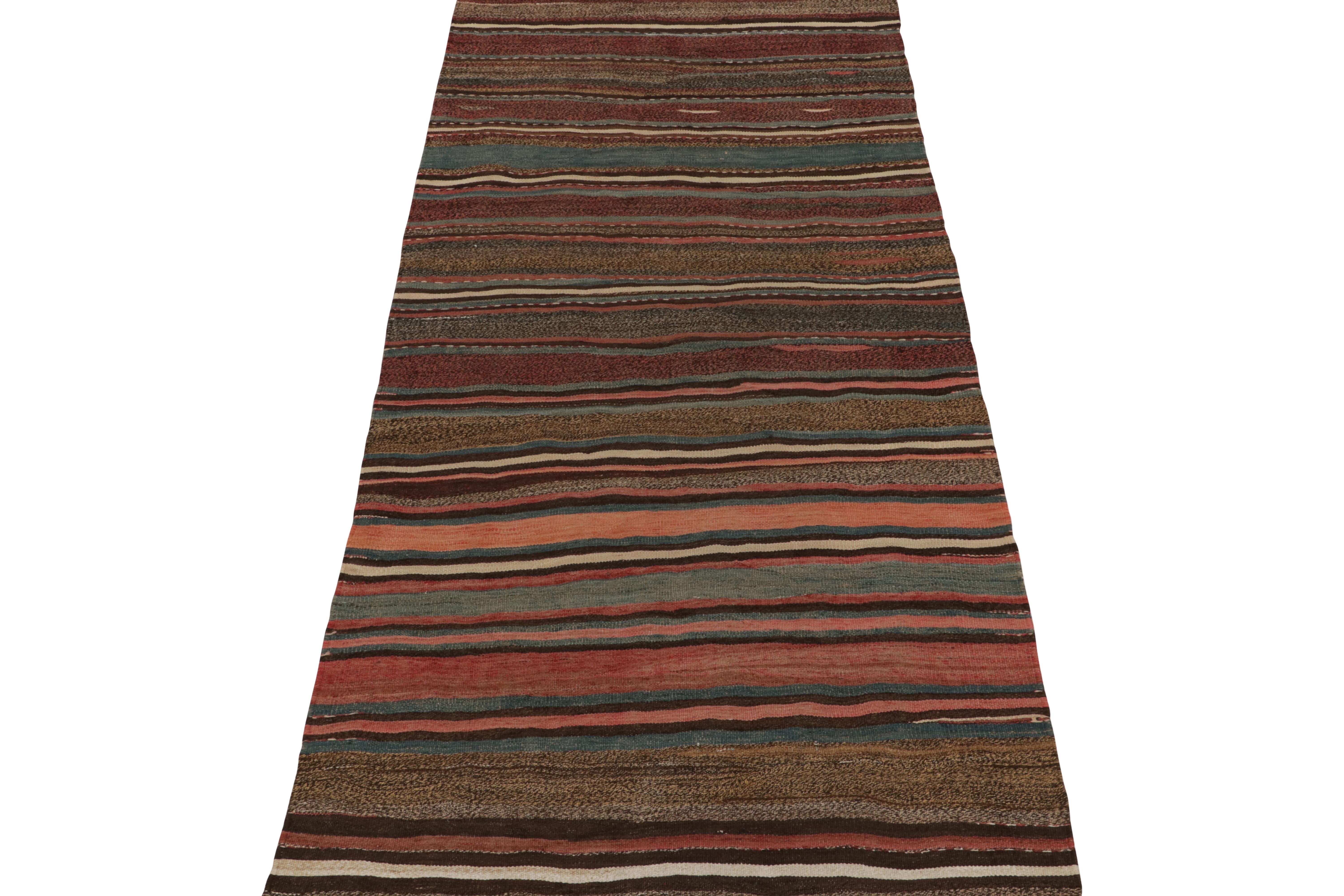 This vintage 5x10 Persian kilim is a unique tribal rug for its period and provenance. Handwoven in wool, it’s believed to be of Shahsavan provenance and originates circa 1950-1960.

Further on the Design:

The field hosts horizontal stripes