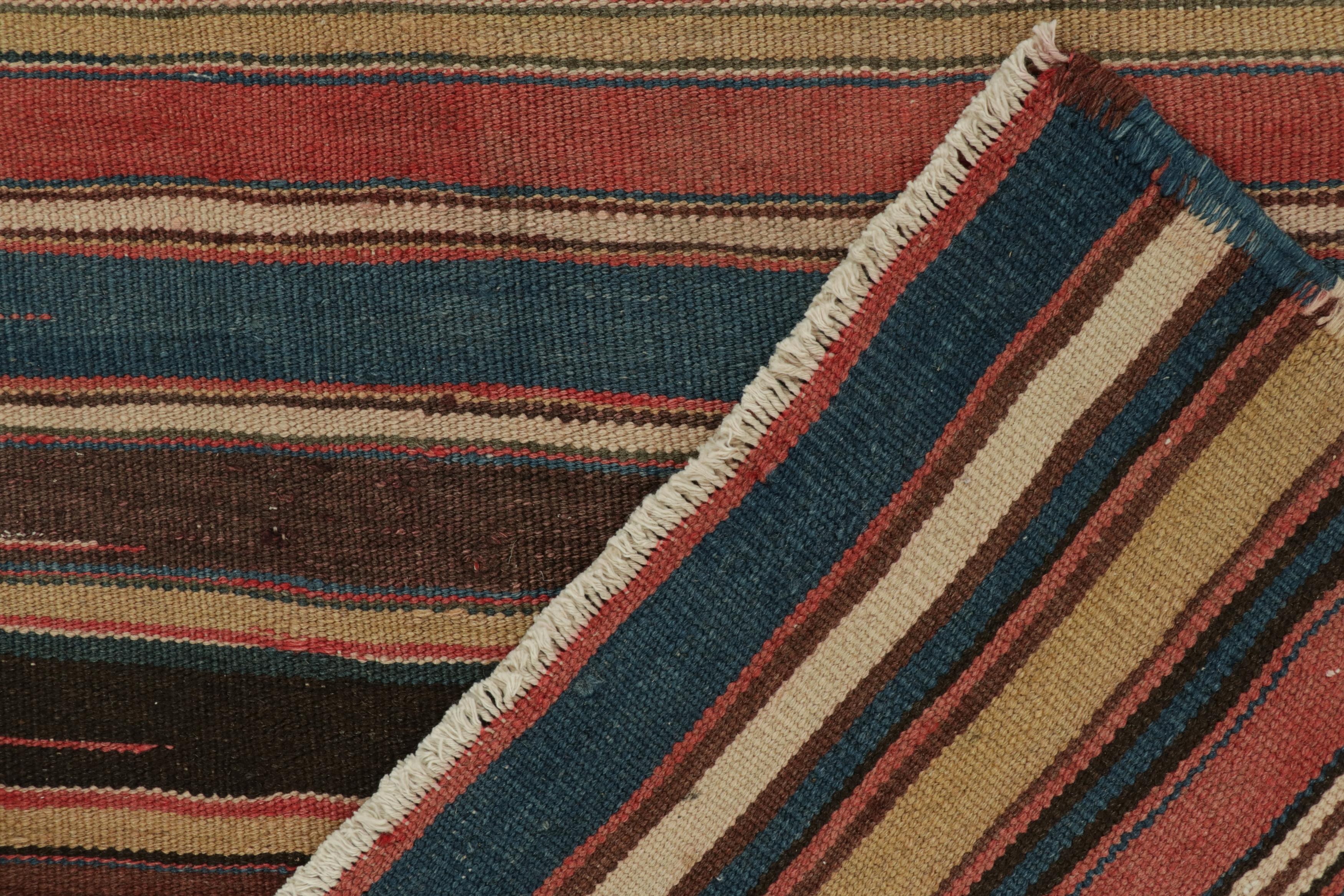 Annodato a mano Tappeto persiano d'epoca Rug & Kilim a strisce policrome in vendita