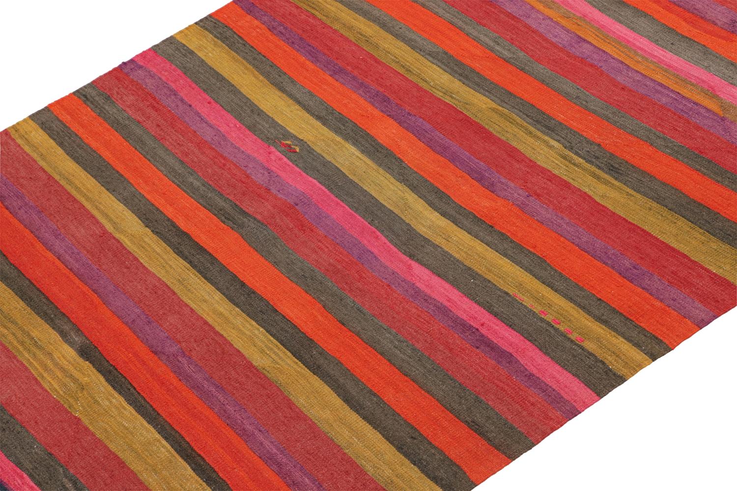 This vintage 5x9 Persian Kilim is a mid-century tribal rug that we believe originates from the Shahsavan tribe. 

On the Design:

Handwoven in wool circa 1950-1960, its design enjoys a polychromatic colorway with stripes in an all-over pattern.