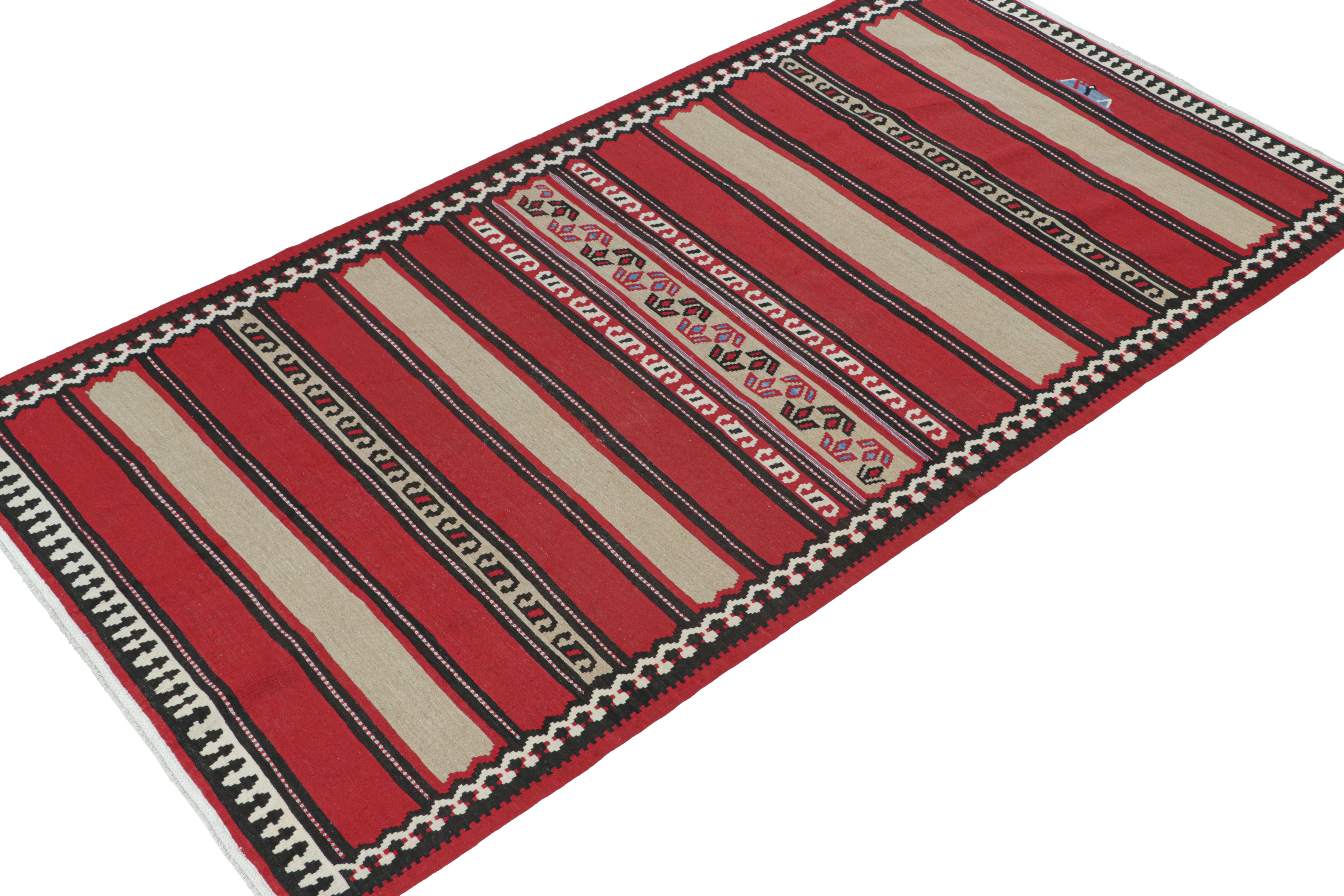 This vintage 5x10 Persian Kilim is believed to be a Shahsavan tribal rug. Handwoven in wool, it originates circa 1950-1960 and enjoys a play of stripes and geometric patterns in red, beige, and brown. 

Further on the Design:

Keen eyes may