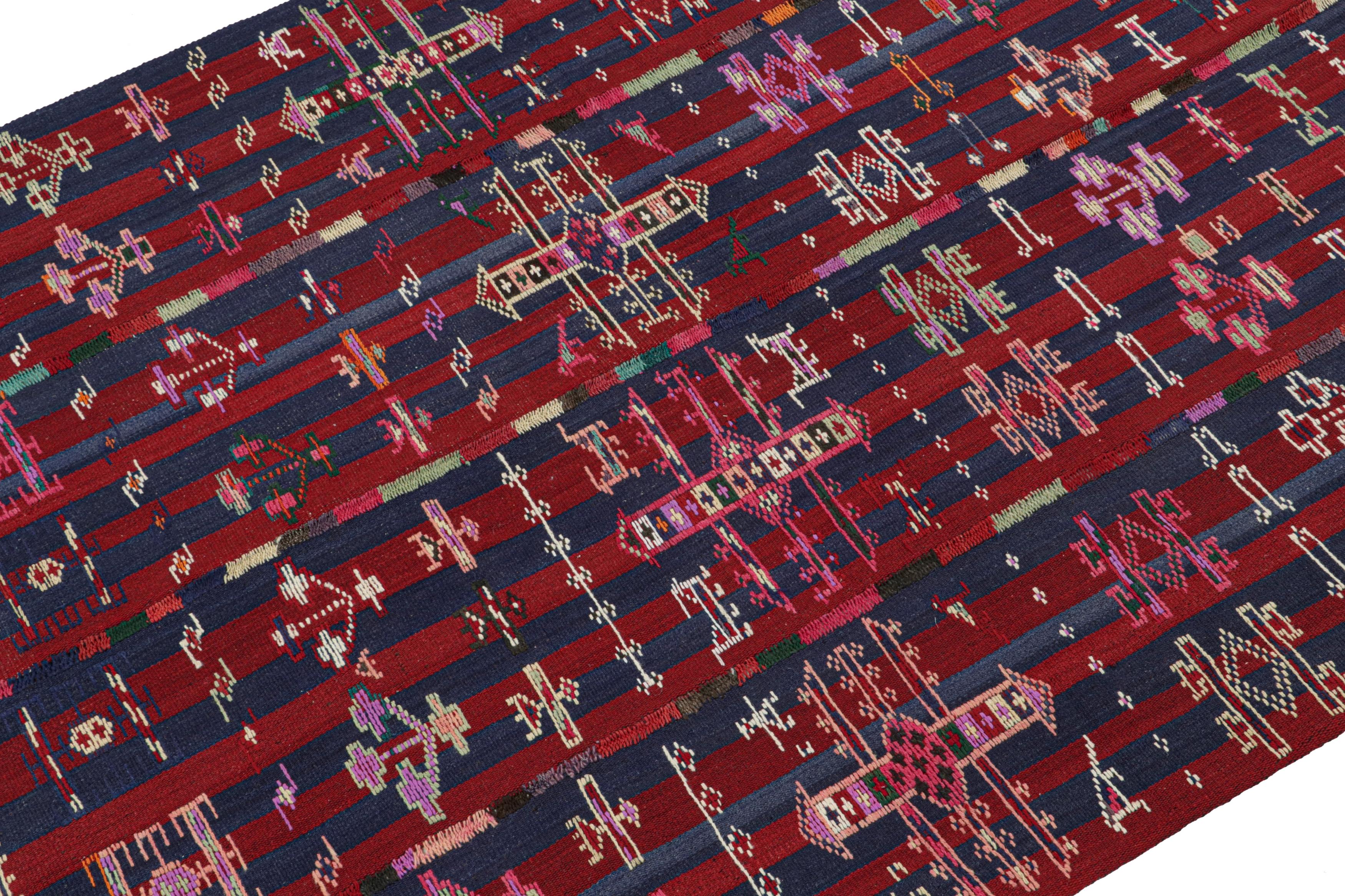 This vintage 6x10 Shahsavan Persian kilim runner is handwoven in wool, and originates circa 1950-1960.

On the Design: 

This runner is made with four long, narrow panels put together. This special kind of flatweave enjoys red and blue with a