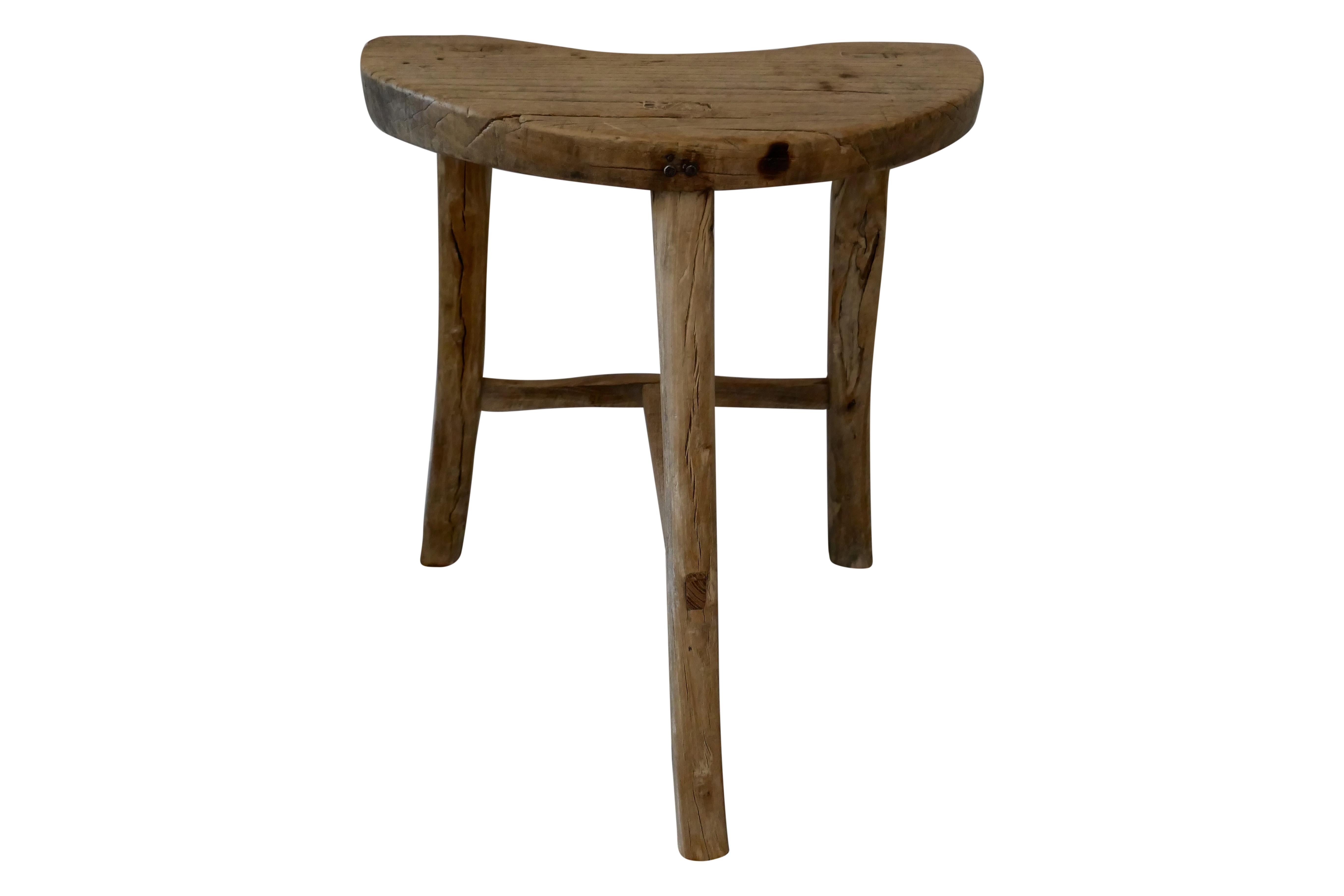Authentic vintage Shandong stool in a very unique style, makes this the perfect accent piece. Solidly built of elmwood, hand-carved and constructed of mortise & tenon joinery. Wonderful natural age and wear characteristics and patina throughout. 