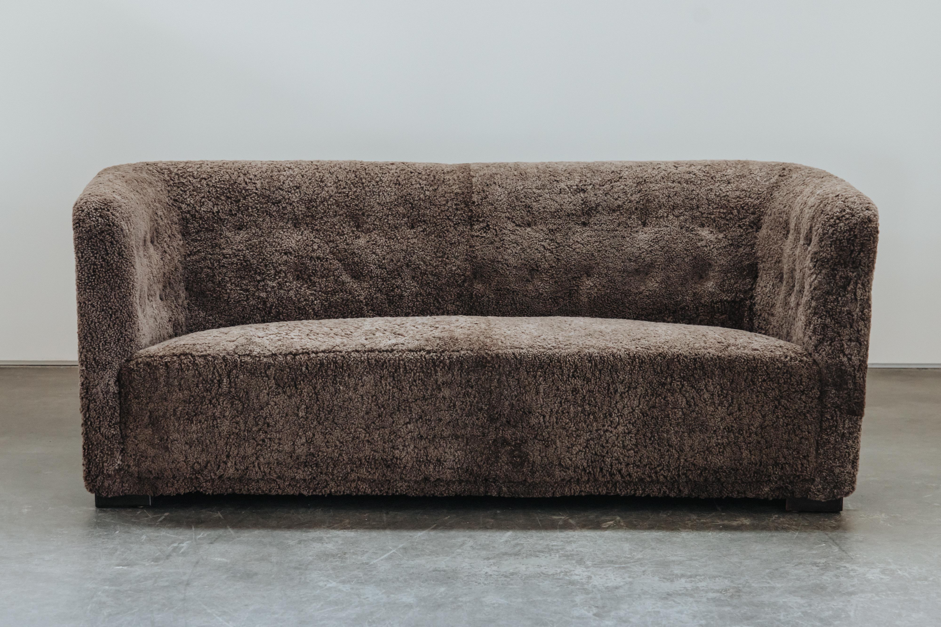 Vintage Shearling Cabinetmaker Sofa From Denmark, Circa 1950.  Comfortable model, later upholstered in Denmark with very soft grey shearling.  Excellent condition.