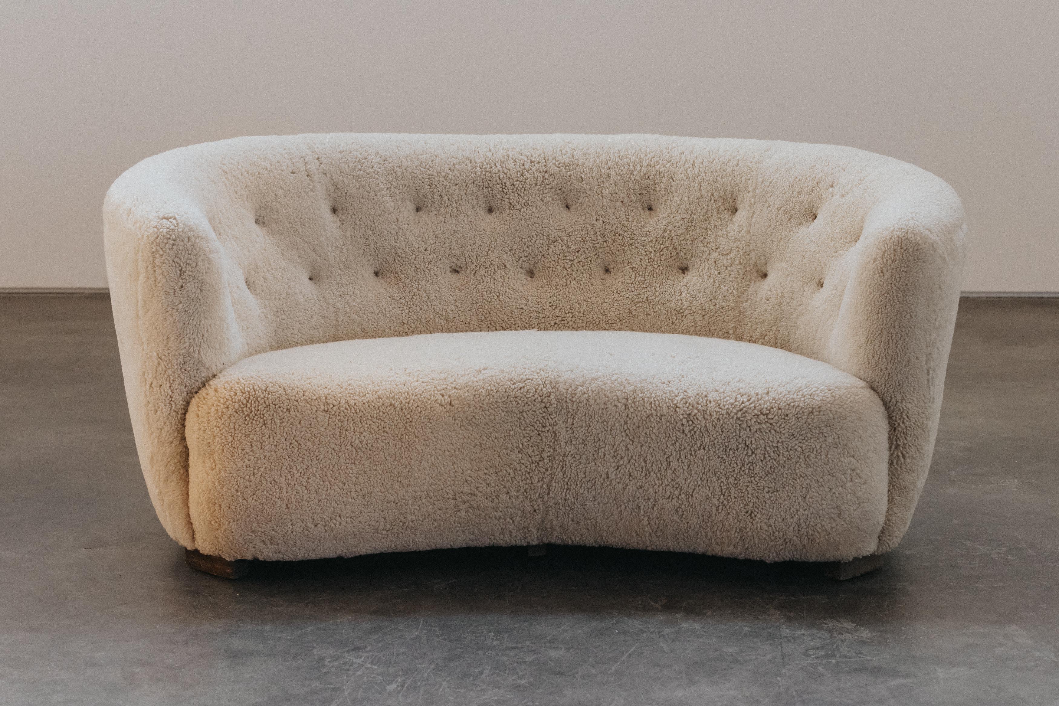Vintage Shearling Loveseat From Denmark., Circa 1950.  Nice model in light colored, soft shearling.  Excellent condition.