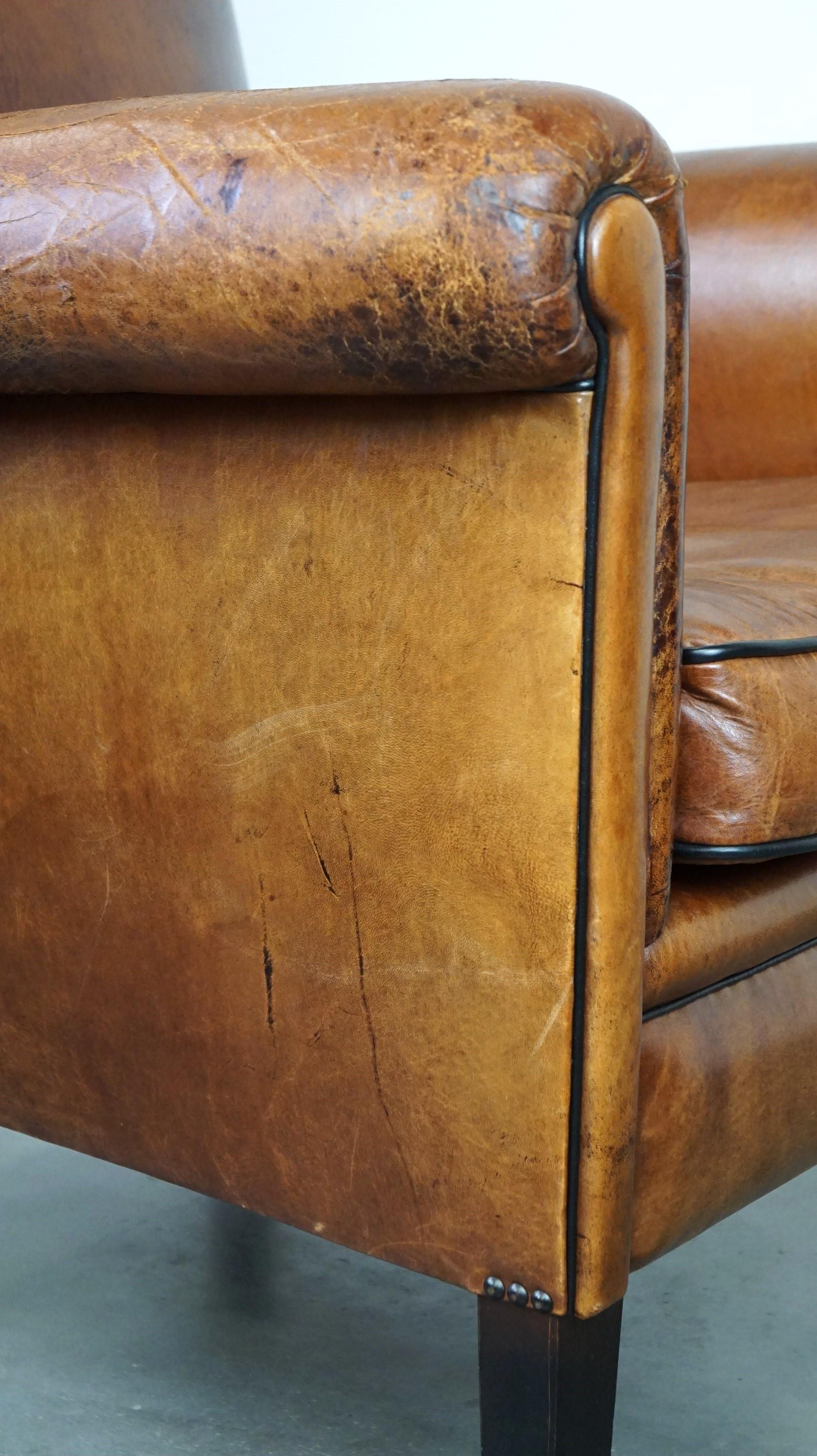 Vintage sheep leather armchair/design armchair with a beautiful look For Sale 4