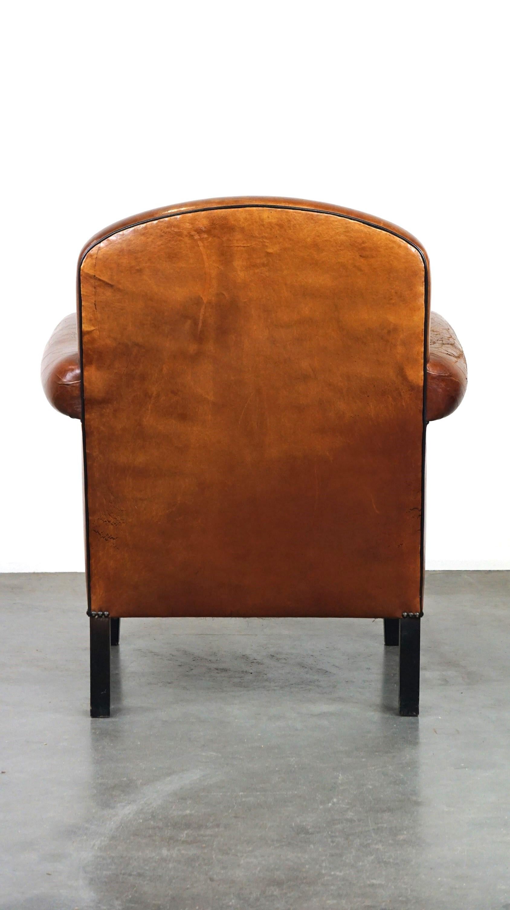 Hand-Crafted Vintage sheep leather armchair/design armchair with a beautiful look For Sale