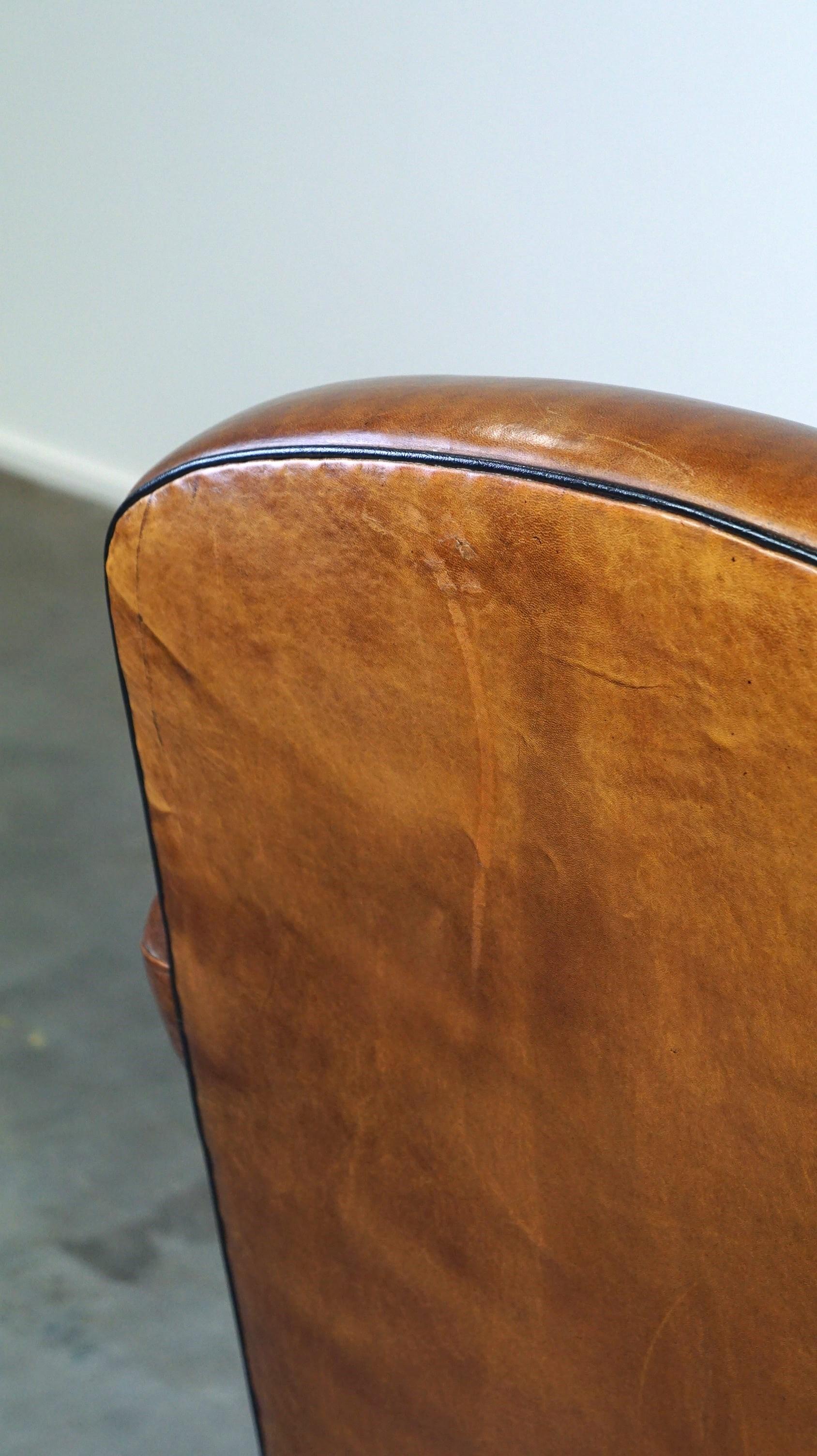 Vintage sheep leather armchair/design armchair with a beautiful look For Sale 5