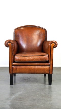 Vintage sheep leather armchair/design armchair with a beautiful look