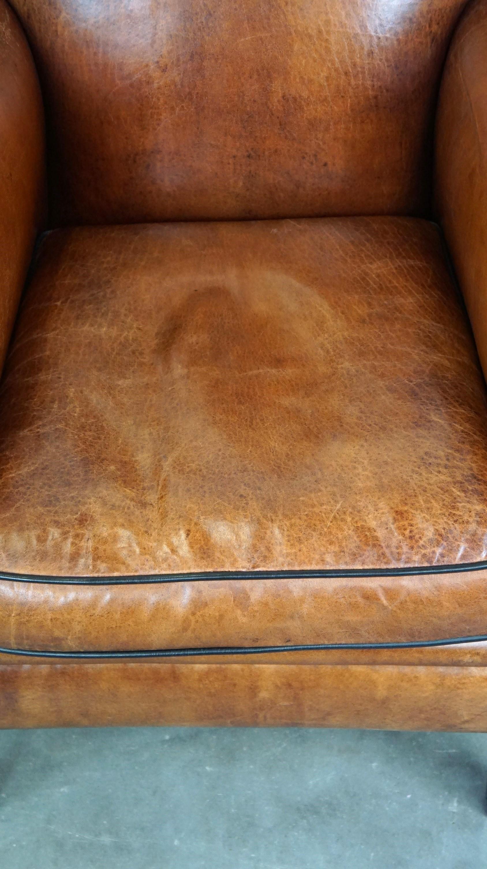 Contemporary Vintage sheep leather armchair/design armchair with a beautiful look For Sale