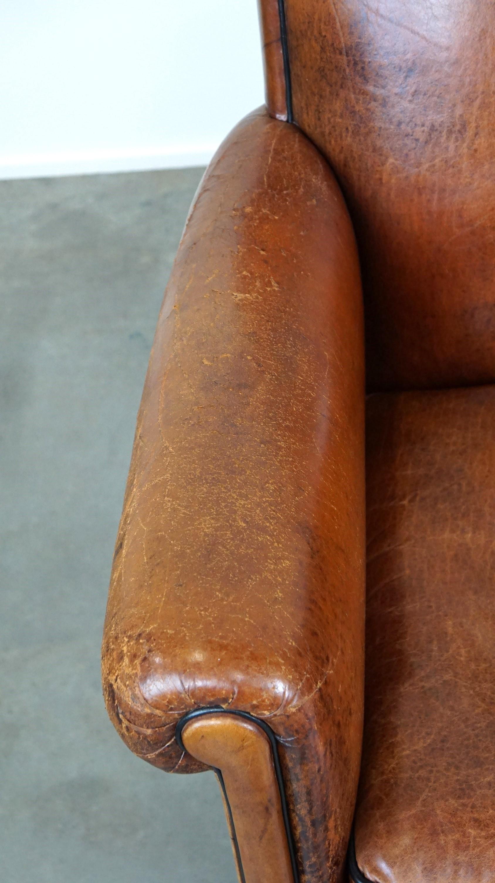 Leather Vintage sheep leather armchair/design armchair with a beautiful look For Sale