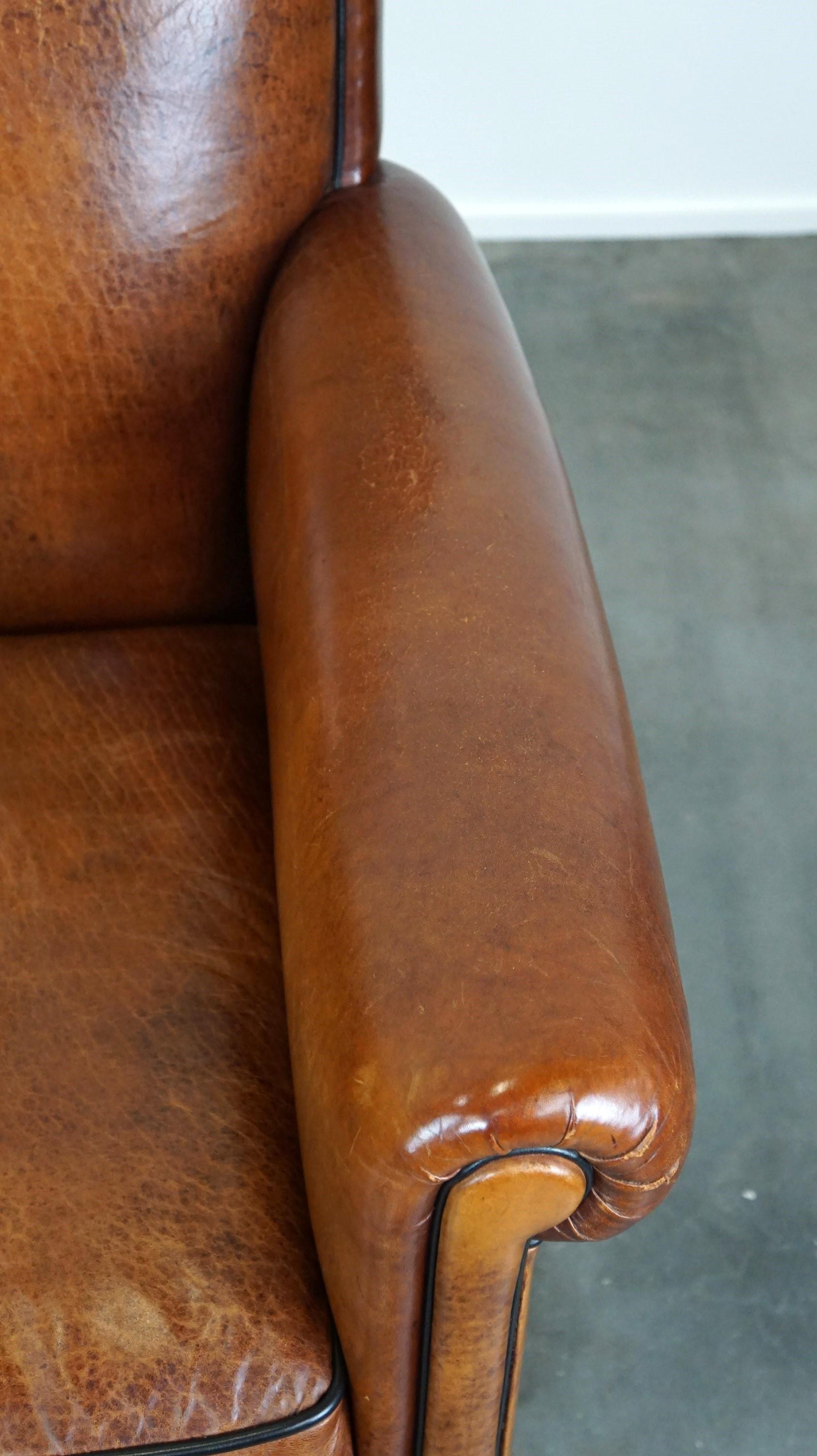 Vintage sheep leather armchair/design armchair with a beautiful look For Sale 1