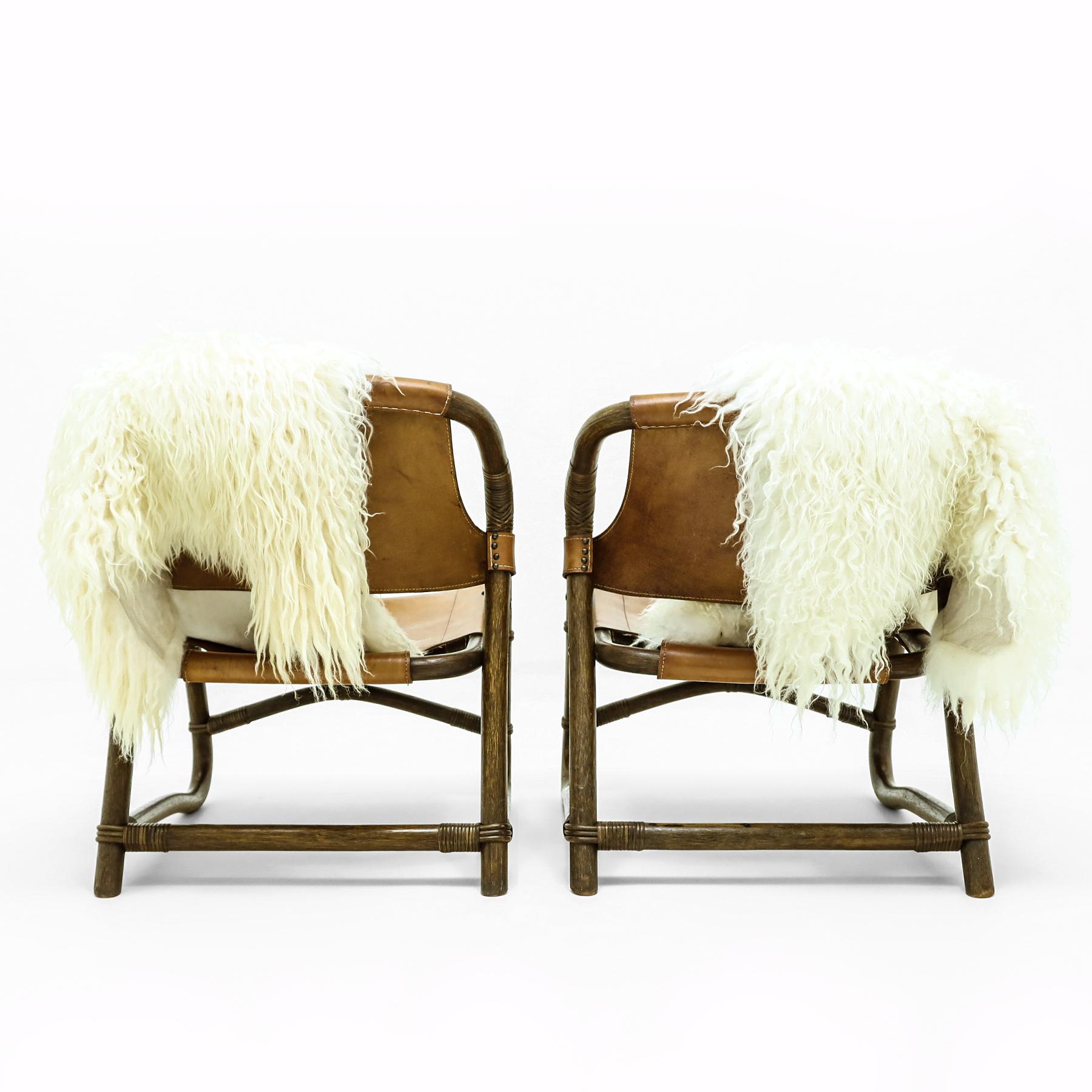 20th Century Vintage sheepskin and leather and cane easy chairs attributed to Rohe Noordwolde For Sale