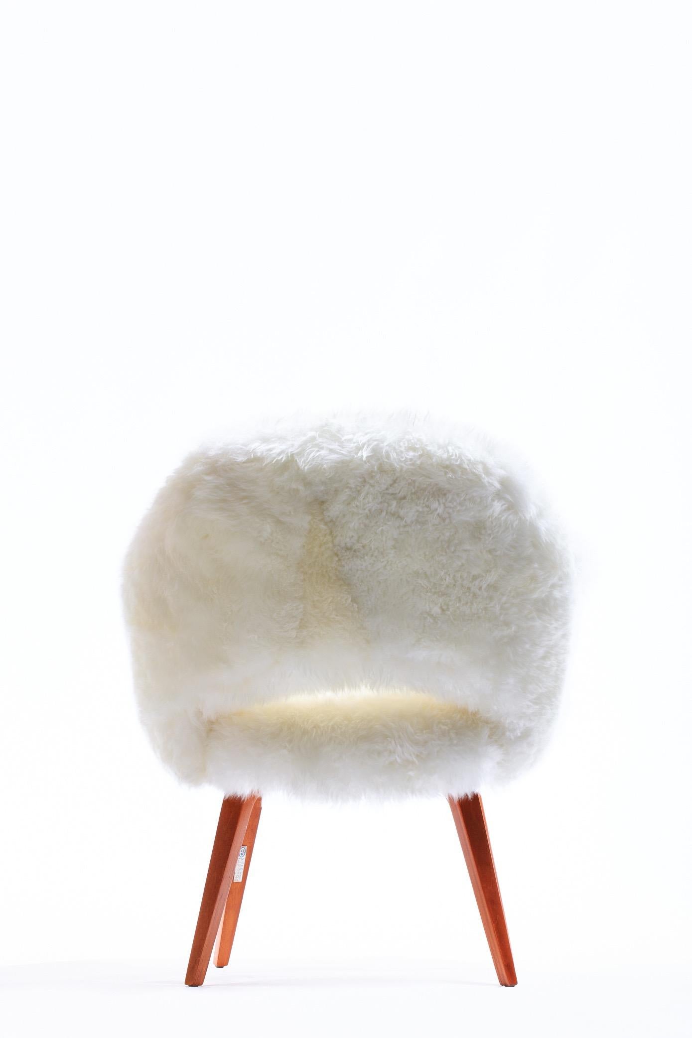 Vintage Sheepskin Eero Saarinen for Knoll Executive Chair with Wood Legs 1