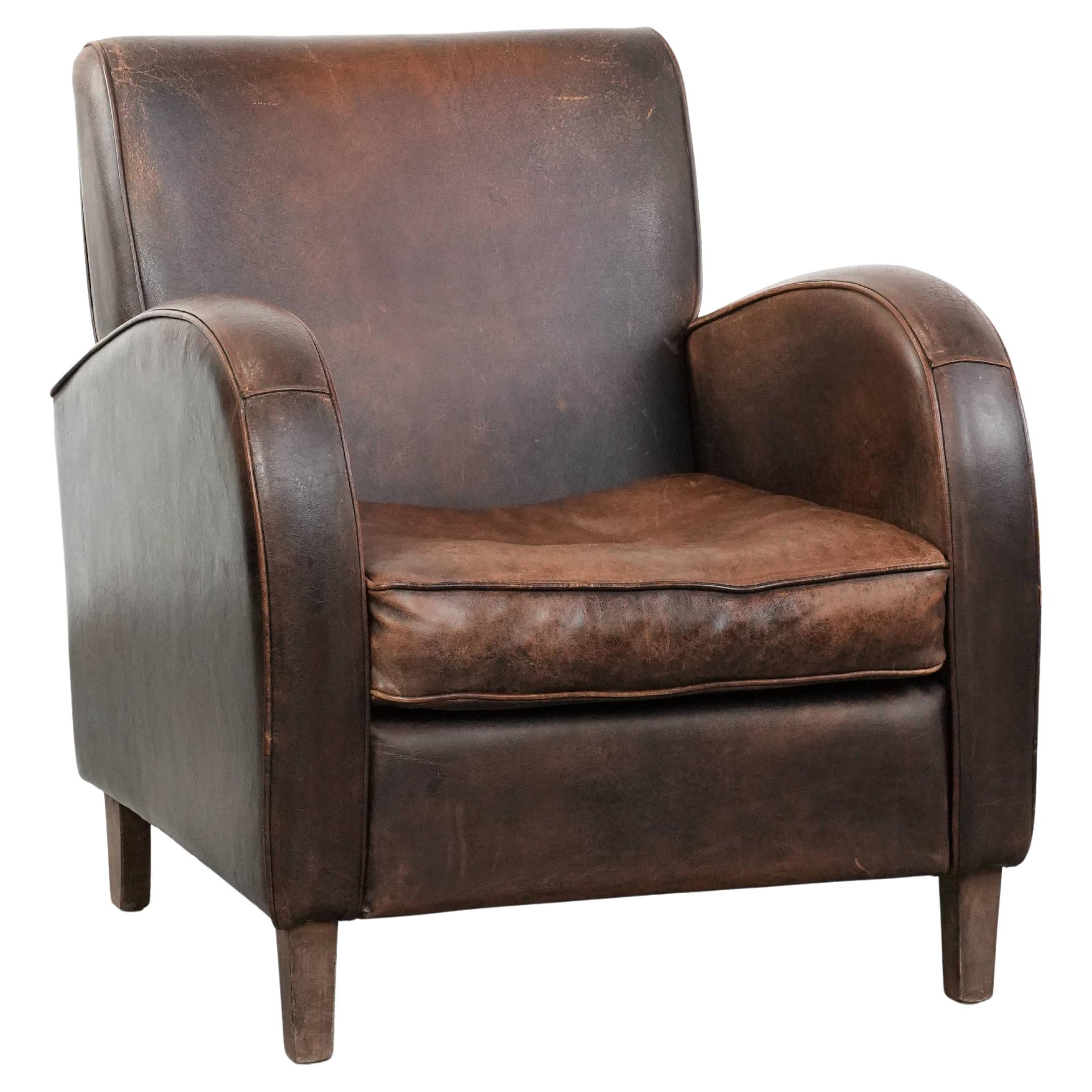 Vintage-Sessel aus Schafsleder in einem dunklen Cognac-Ton im Angebot