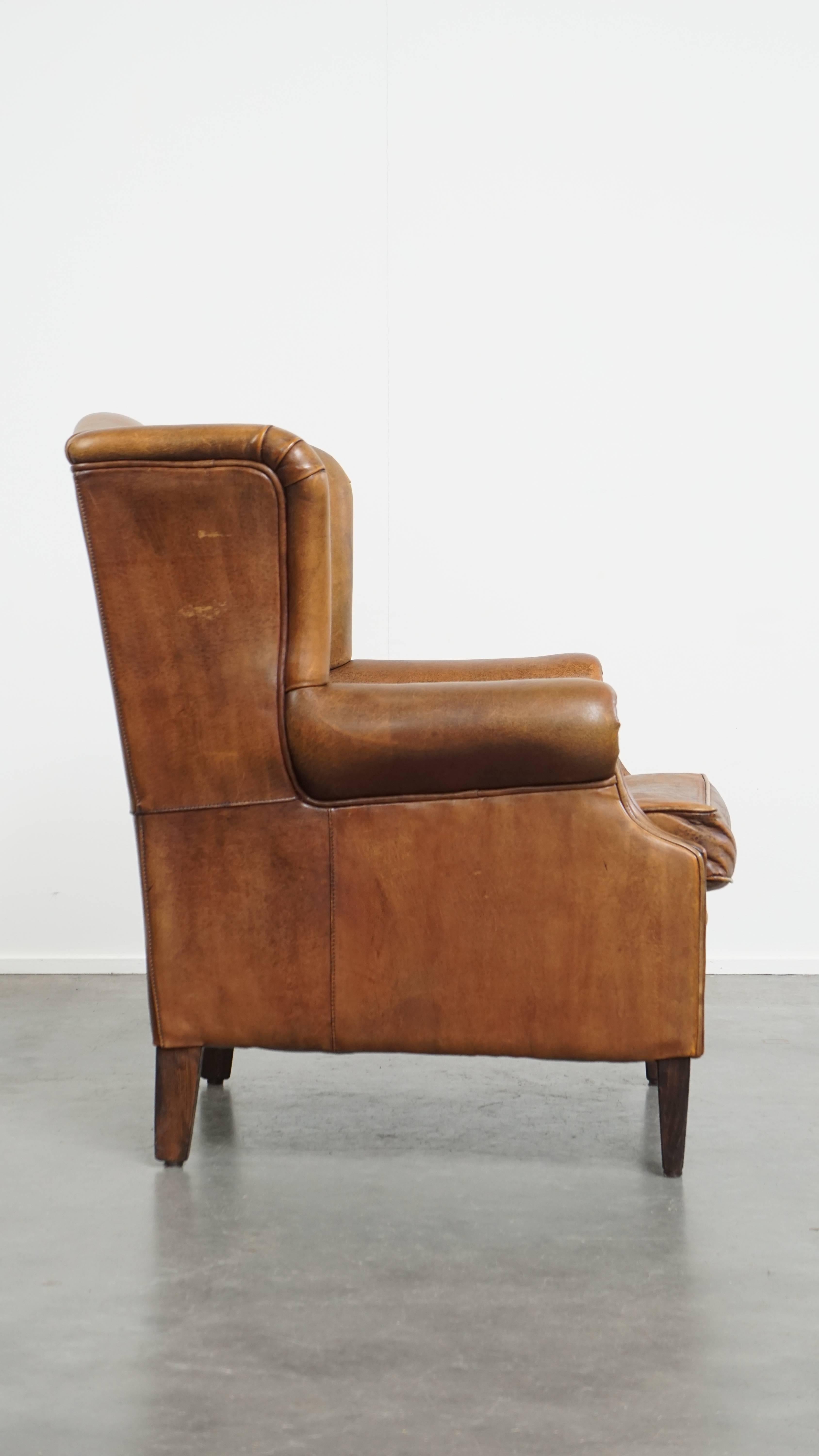 Classical Roman Vintage Sheepskin Leather Wingback Chair For Sale
