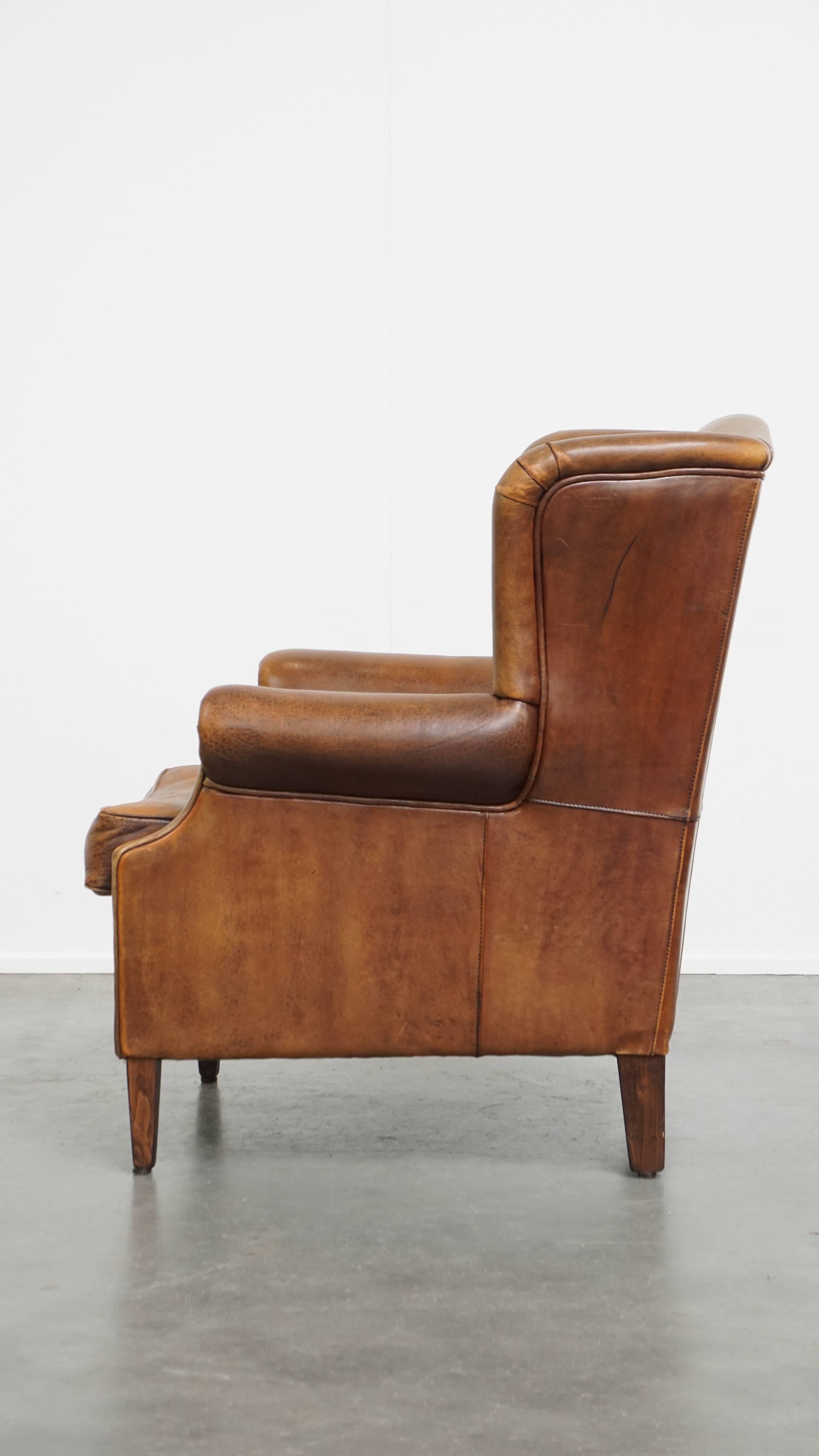 Vintage Sheepskin Leather Wingback Chair In Fair Condition For Sale In Harderwijk, NL