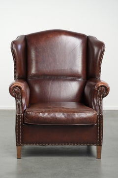 Poltrona wingback in pelle di pecora vintage con un look inglese senza tempo
