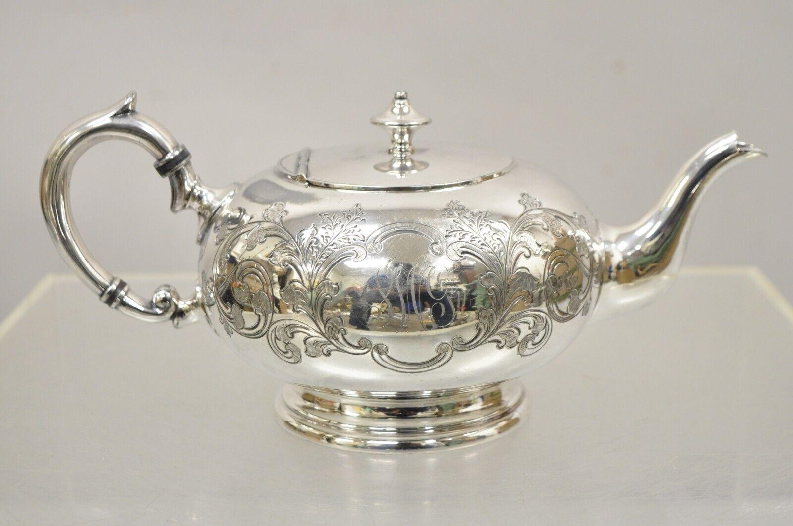 Vintage Sheffield Brimet Gladwin 2 Pint Silver Plated Tea Pot. Item features etched Monogram to side, original hall mark, ornate handle. Circa Early 20th Century. Measurements: 5