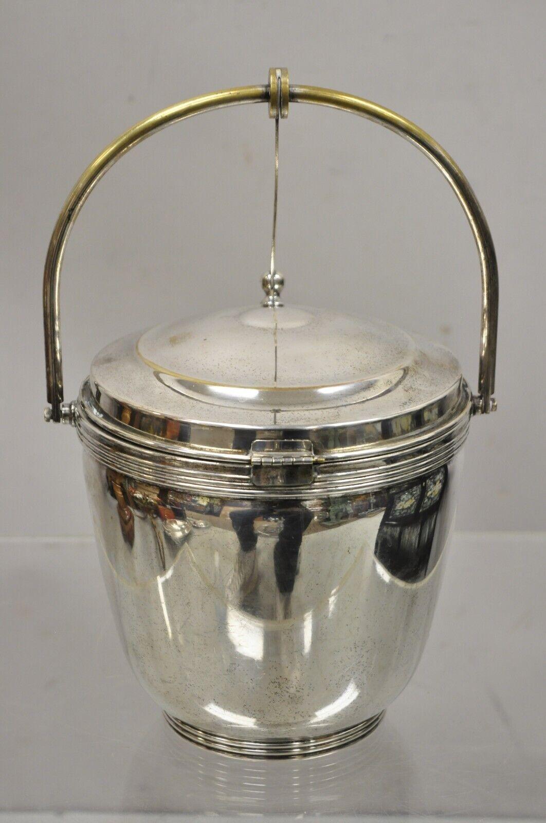 Vintage Sheffield Silver Co. Silver Plate Regency Style Reticulating Hinge Ice Bucket. Item features a white milk glass liner, reticulating hinge lid, original stamp, very nice vintage item, clean modernist lines, great style and form. Circa Mid