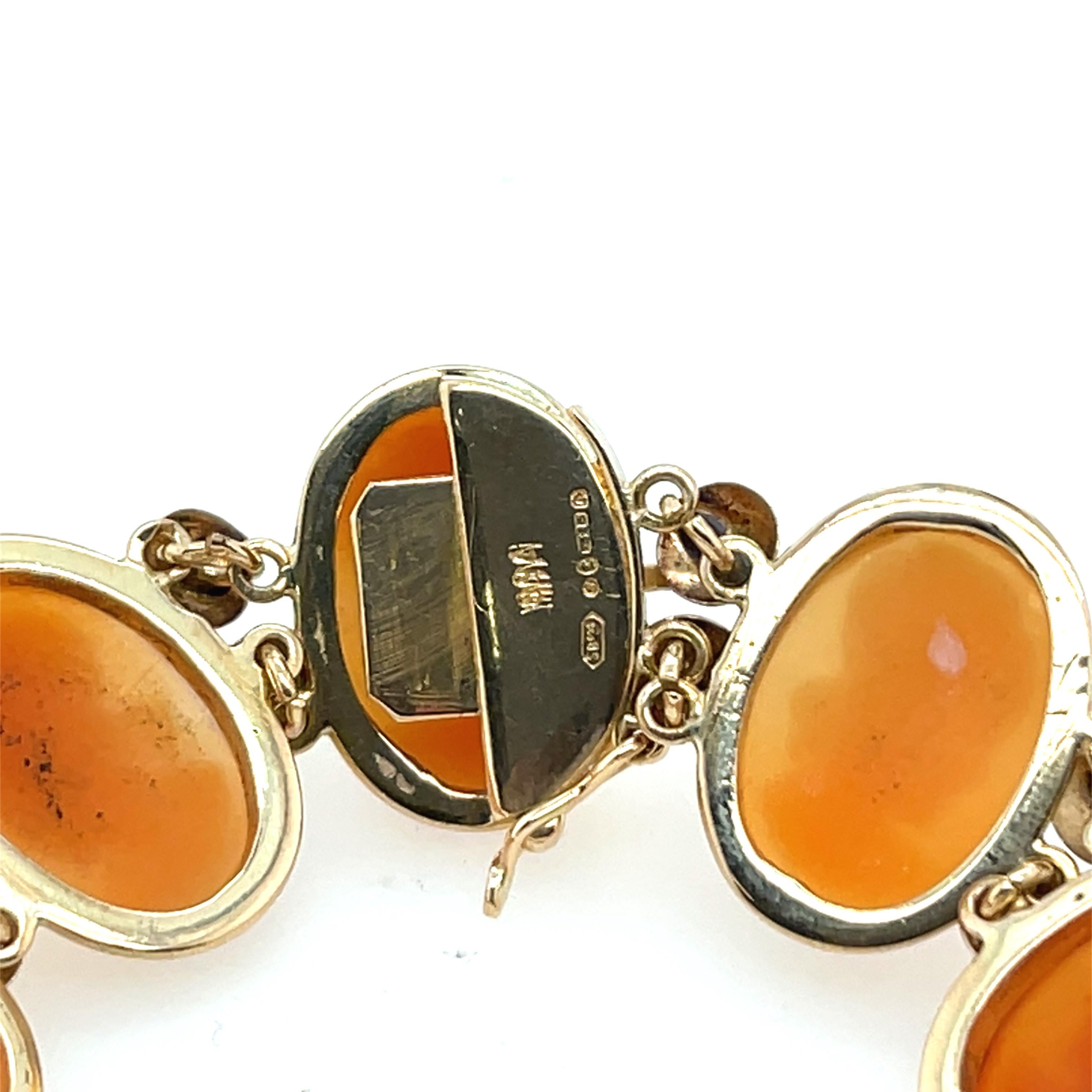 This beautiful 14ct vintage cameo bracelet features cameos set in rich yellow gold. The intricate details of each cameo evoke a timeless elegance, making this bracelet a perfect accessory 
for vintage jewellery lovers.


Total Weight: 21.34g
Item