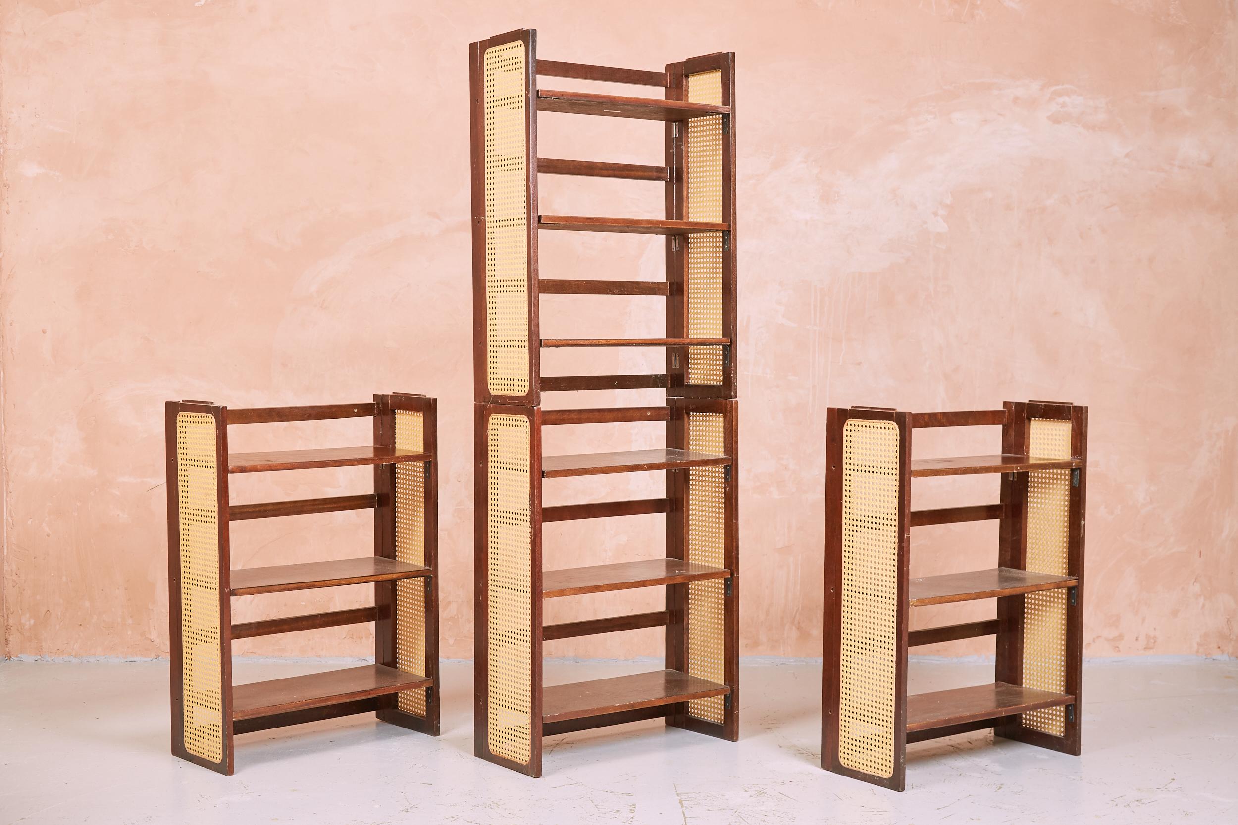 A set of vintage stackable mahogany shelves with cane sides.
These are priced individually and we have two units available as pictured so please let us know how many you would like.
Very versatile as they are free standing, suitable to be used
