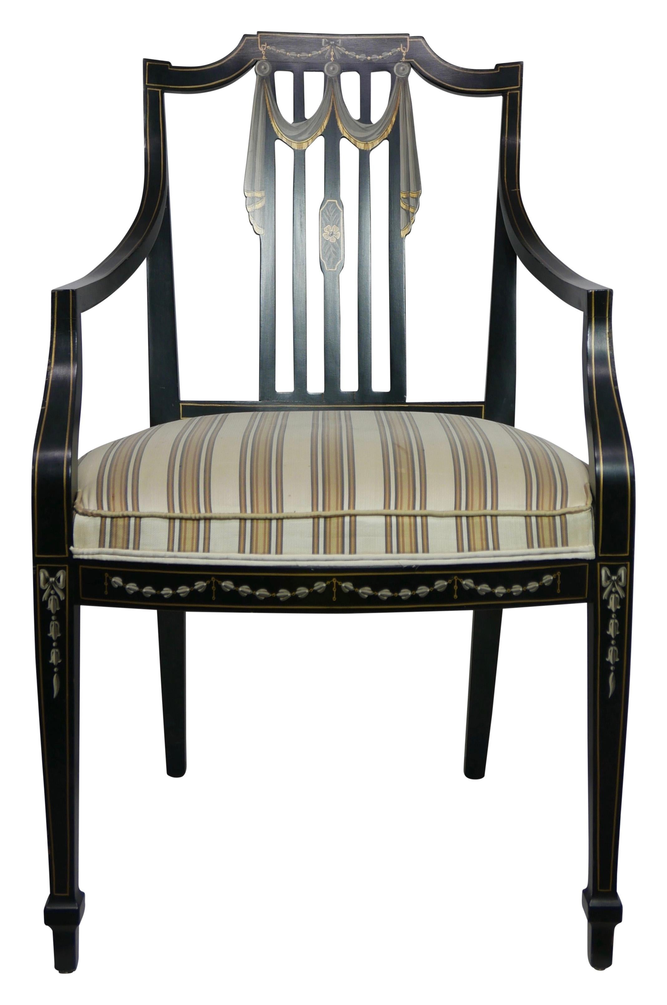 A set of four Sheraton style dining chairs painted black and having painted decorations with draped swags of blue bells.
American, early to mid 20th century
Vintage fabric shows light signs of use and age.
Chair frames are in excellent condition,
