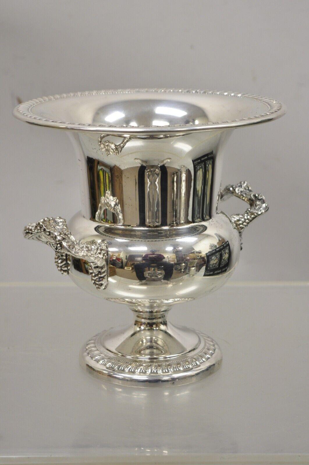 Vintage Sheridan silver plate Regency Style Champagne Chiller Trophy Cup Ice Bucket. Item features ornate decorative handles, original stamp, very nice vintage item, quality craftsmanship. Circa Early to Mid 20th Century. Measurements: 9