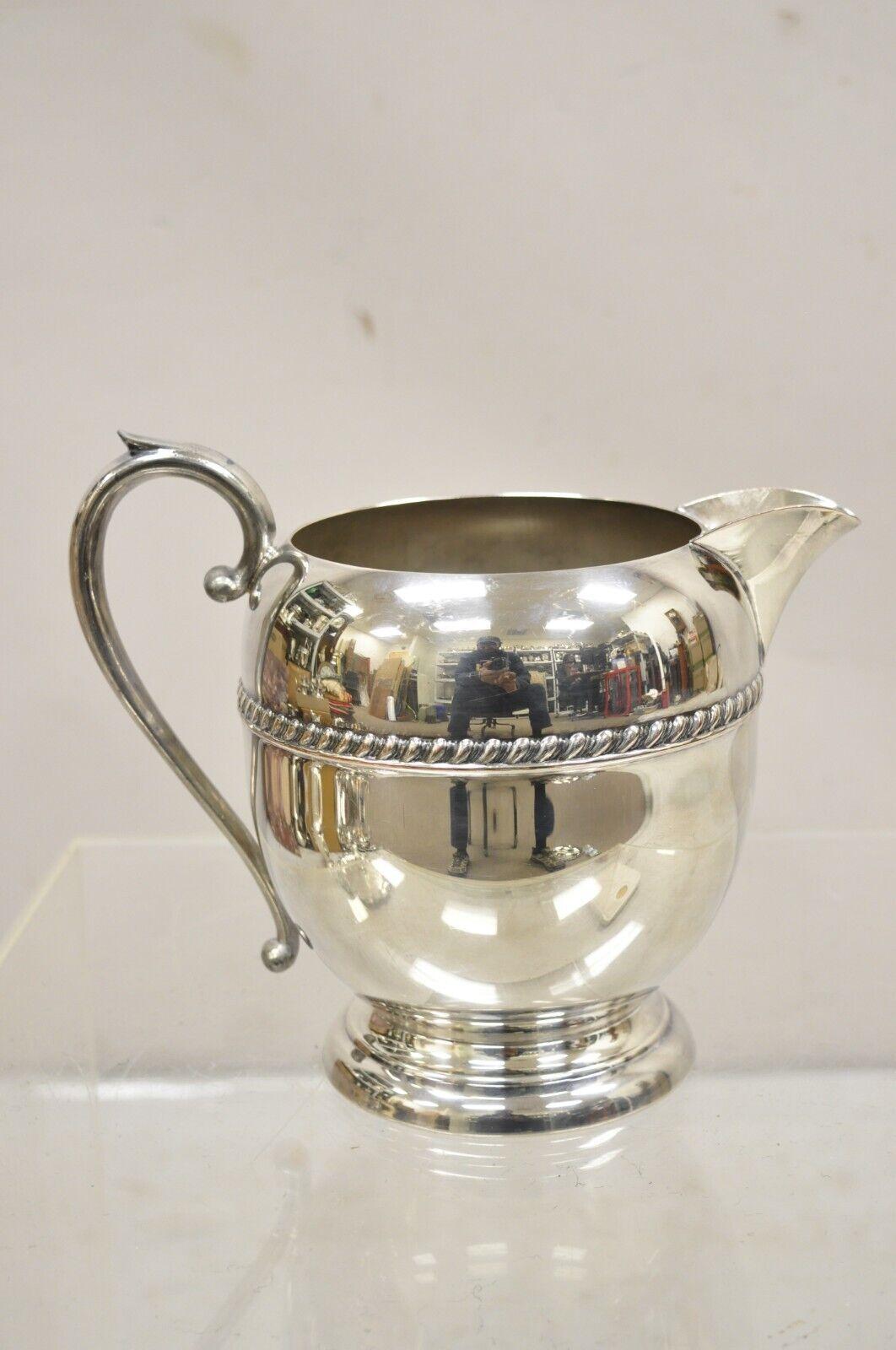 Vintage Sheridan Silver Plated Victorian Style Bulbous Water Pitcher. Circa Mid 20th Century. Measurements:  8