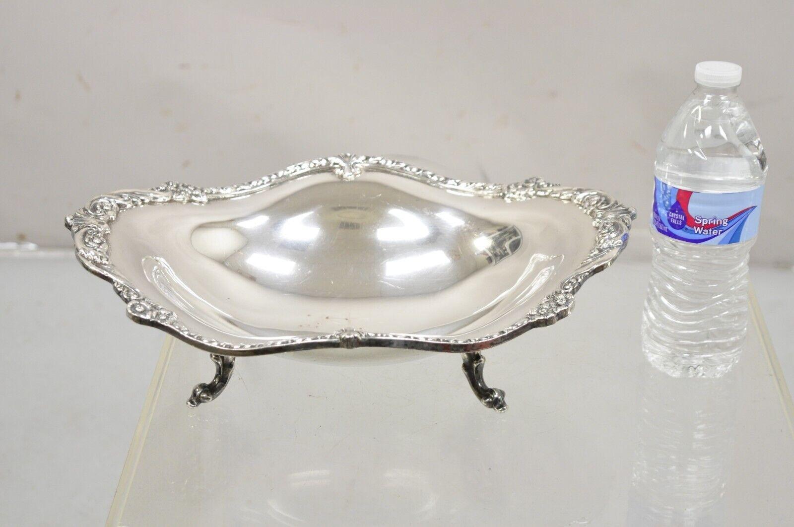 Vintage Sheridan Victorian Style Silver Plated Footed Scalloped Oval Fruit Bowl. Circa Mid 20th Century. Measurements: 4