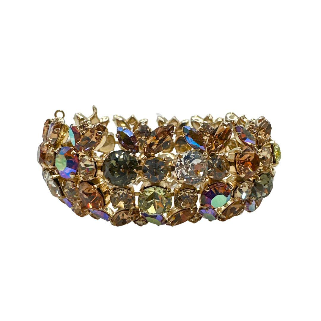 Length: 7.75″

Bin Code: C5 / P8

Elevate your jewelry collection with this stunning Vintage Sherman Multi-Color Rhinestone Bracelet. Crafted with exceptional artistry and marked with the renowned Sherman signature, this bracelet embodies the
