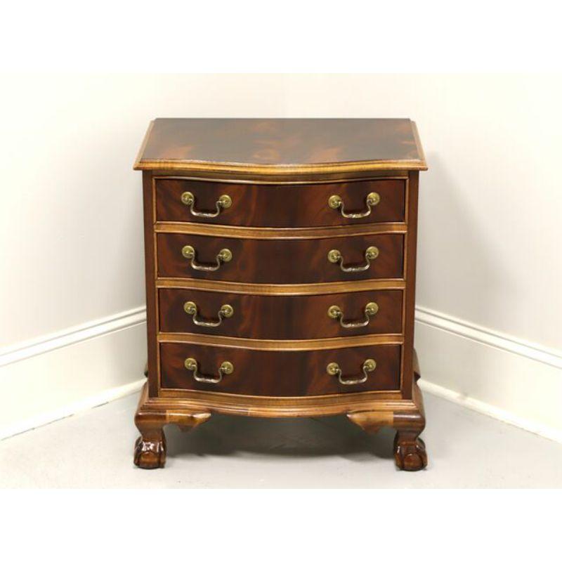 A Chippendale style bedside chest by Sherrill. Flame mahogany with brass hardware, slight bowfront, ogee edge to top, and ball in claw feet. Features four drawers. Made in the USA, in the late 20th Century.

Measures: 23.25 W 15.75 D 25