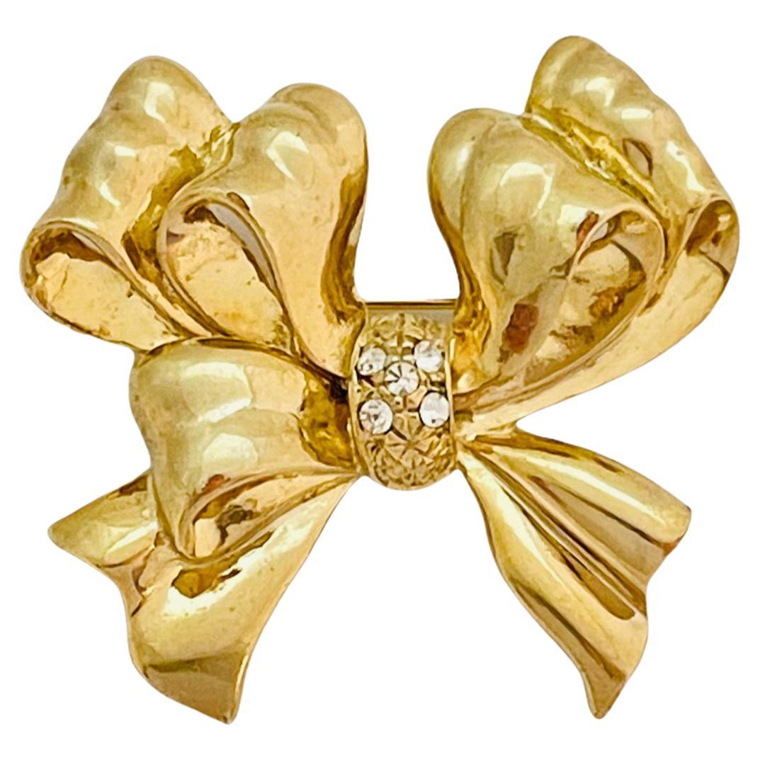 Vintage shiny gold bow brooch For Sale