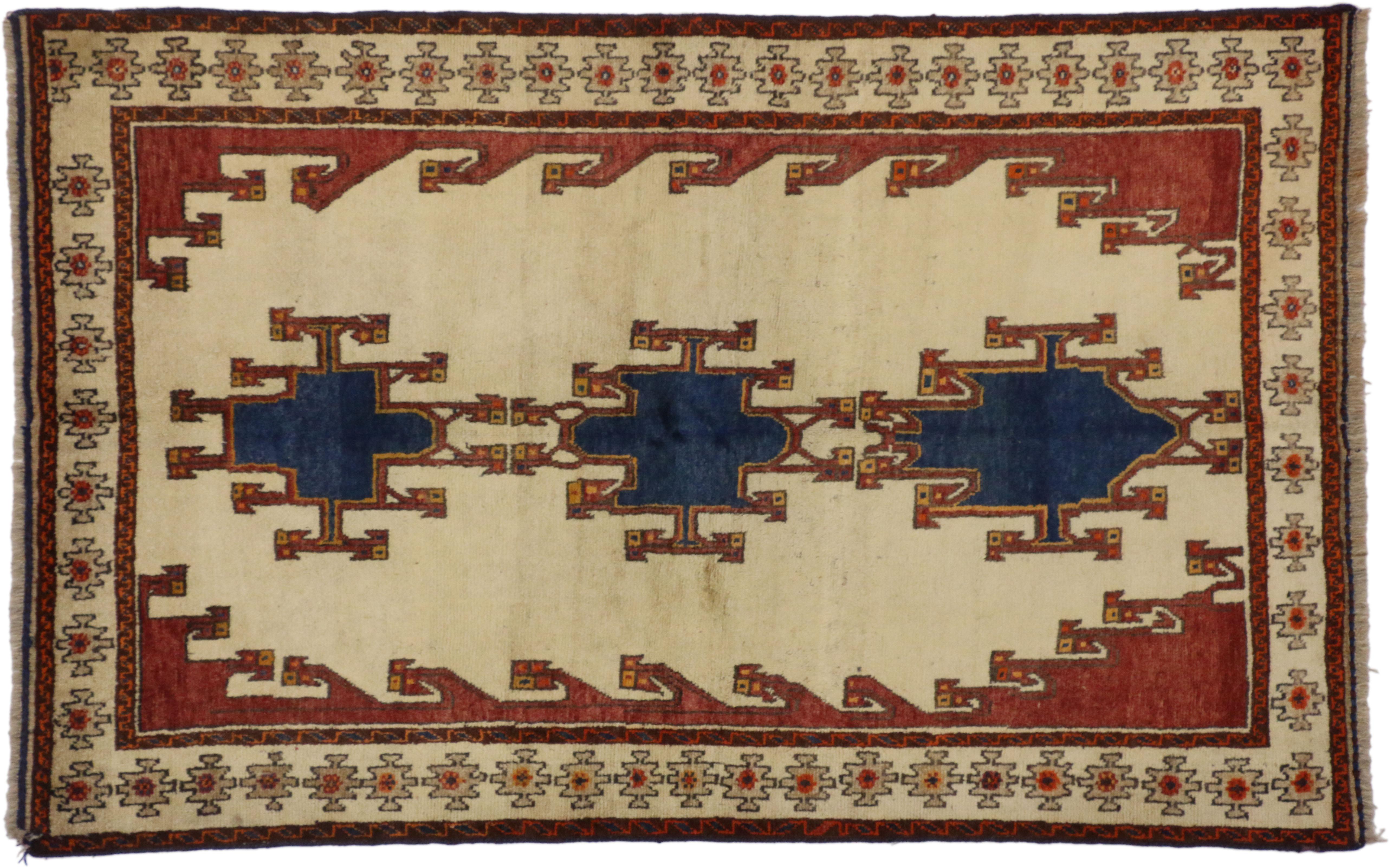 75066 Vintage Persian Shiraz Accent Rug with Tribal Style 04'08 x 07'04. This hand-knotted wool vintage Shiraz Persian rug with modern tribal style features three blue geometric medallions outlined with a border known as birds in a tree. The triple