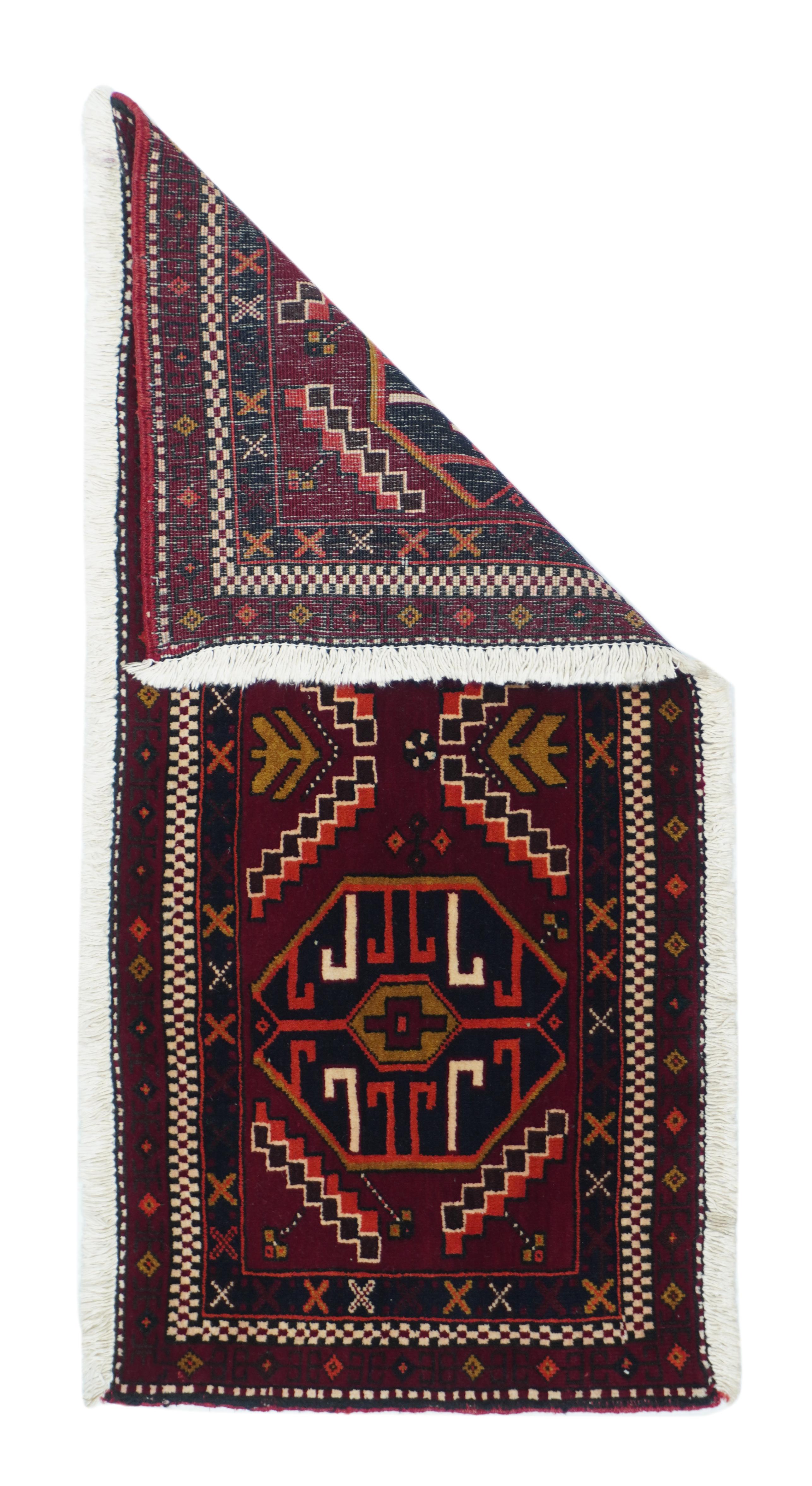 Vintage Shiraz rug measures: 1'8'' x 3'10''.