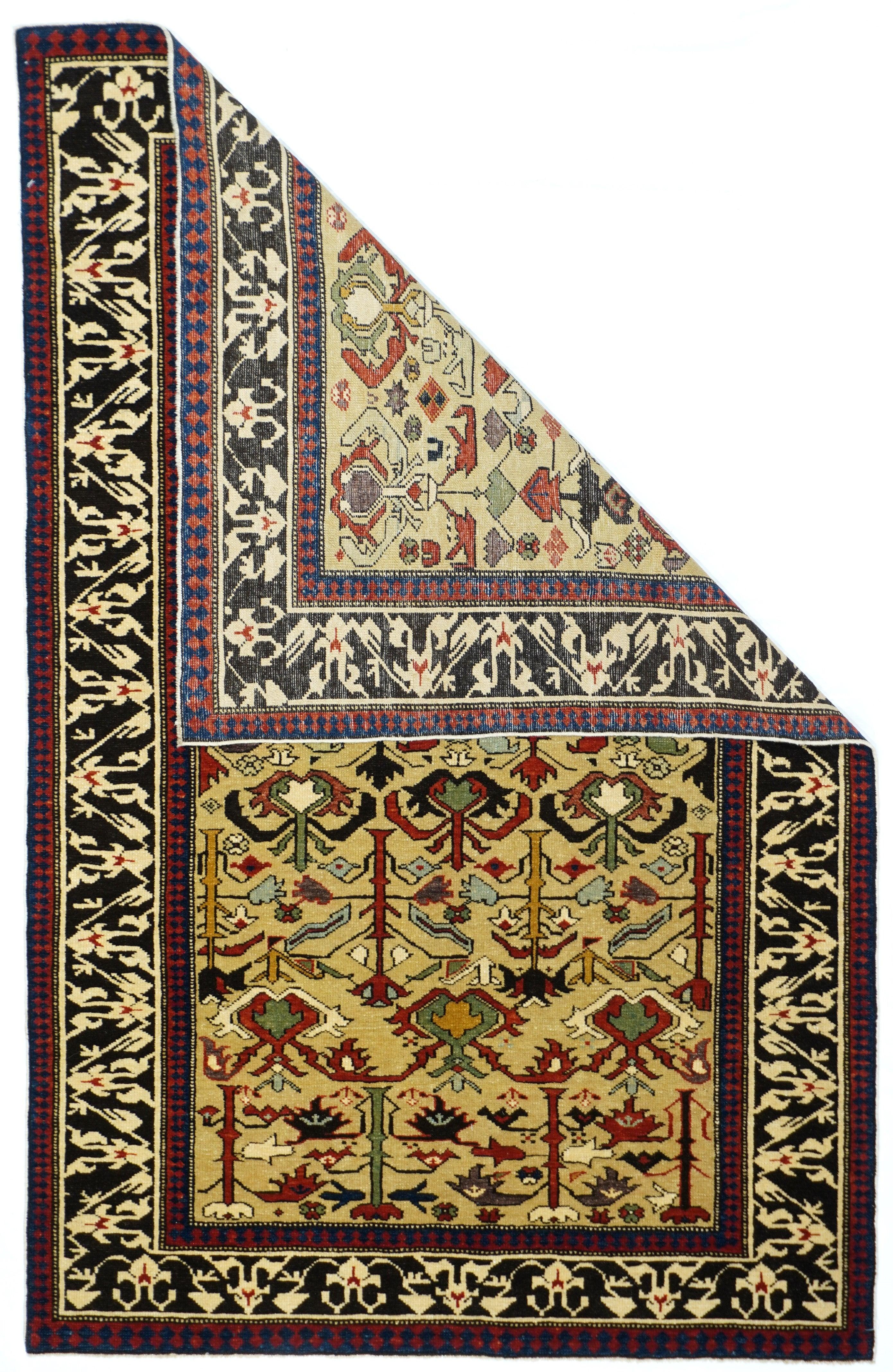 Vintage Shirvan rug 3'3'' x 5'10''. Vintage Shirvan rug¬†3'3'' x 5'10''. The complex textile-like floral pattern has opened up slightly, exposing more of the straw ground with accents in green, rust, deep red and black. No blues. Excellent dark
