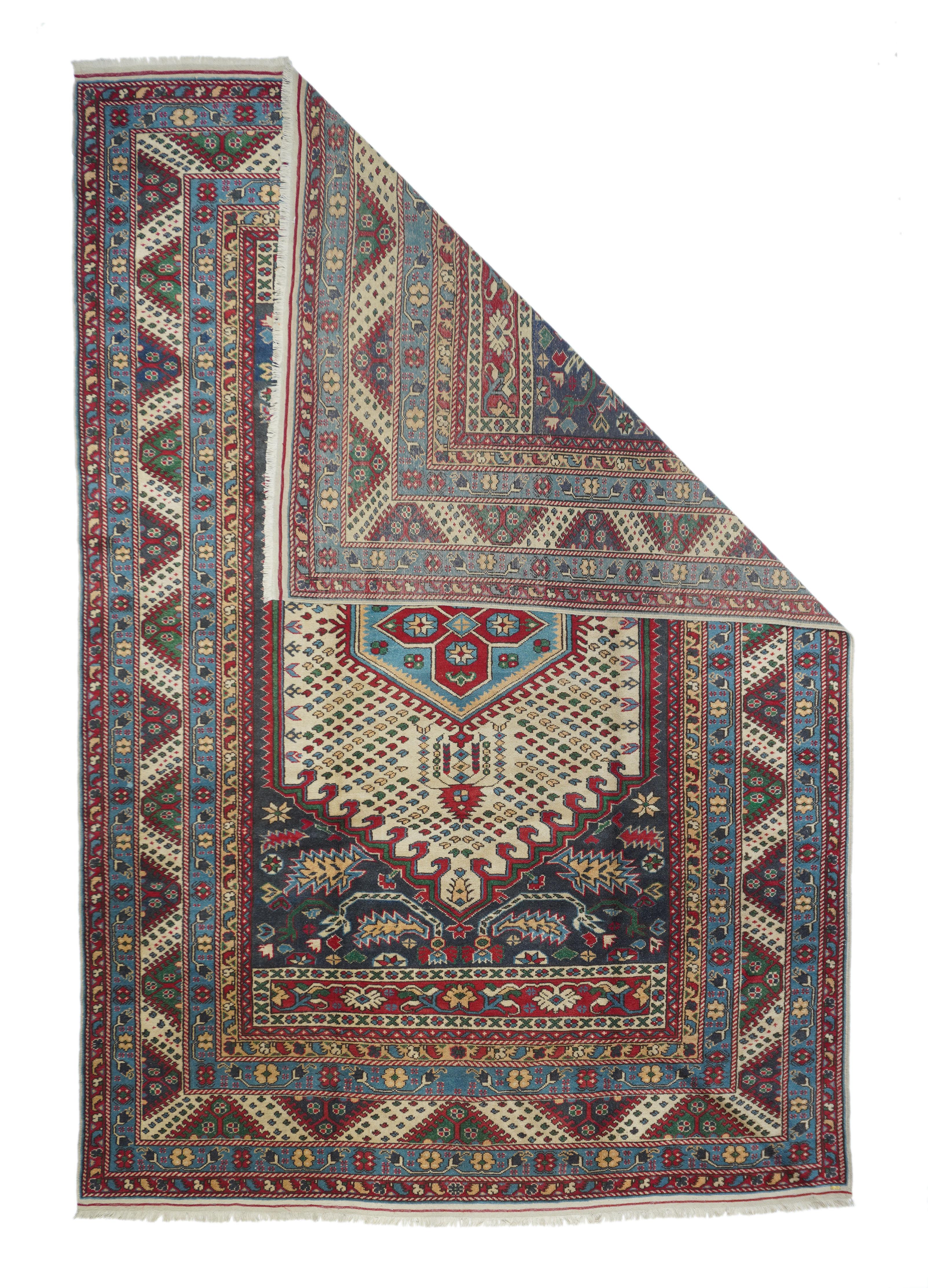 Vintage Shirvan rug¬†6'2'' x 9'5''. Look Turkish, but actually a masquerading vintage Caucasian with a red field with barbed sickle leaf corners around a cream hooked hexagonal sub-field with sinekli (flyspot) decoration and a hexagonal pale blue