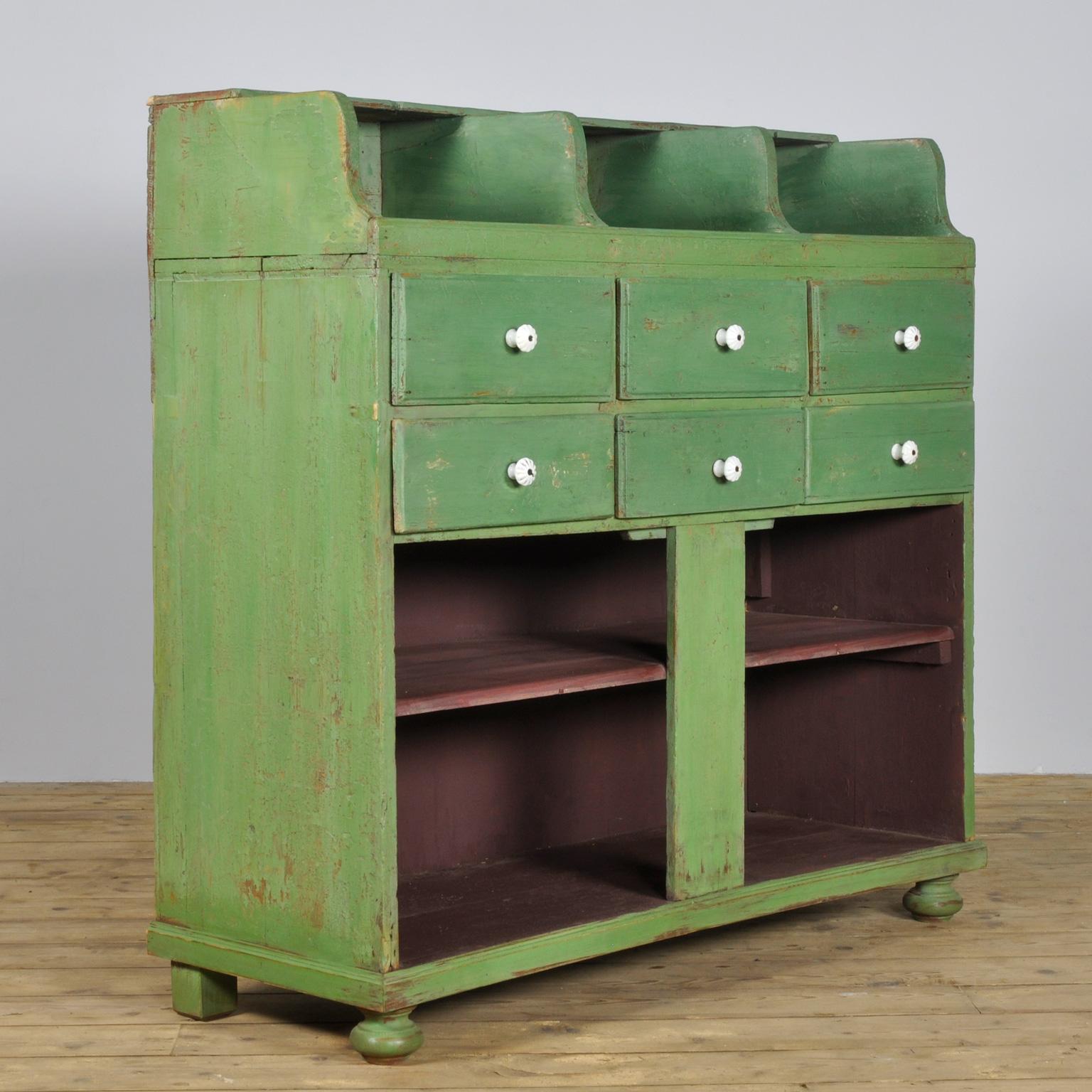 Vintage shop fitting from the 1930s. Made of pine. With 6 drawers.