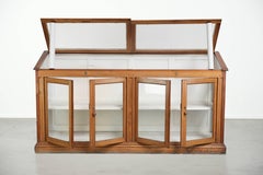 Vintage shop/museum display cabinet with shelves, doors and an opening top