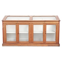 Vintage shop/museum display cabinet with shelves, doors and an opening top