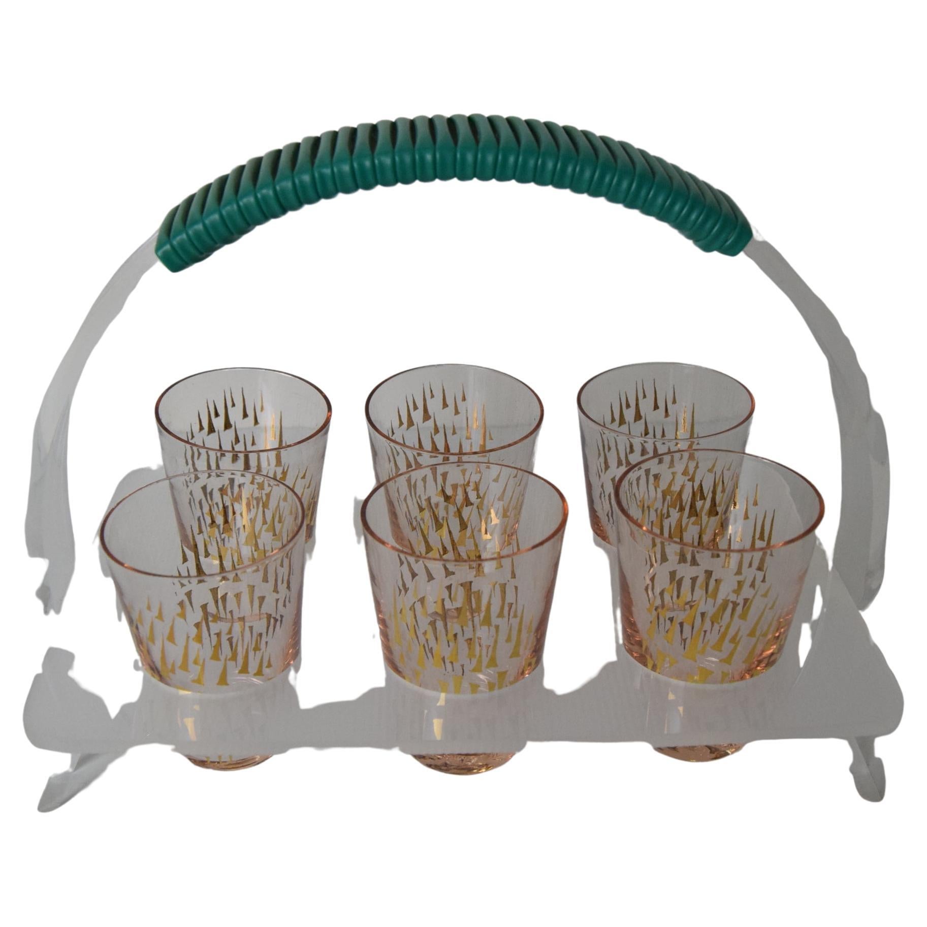 
Seis vasos de chupito en soporte de plástico
Cristal: altura 6 cm, anchura 4 cm
Estado original