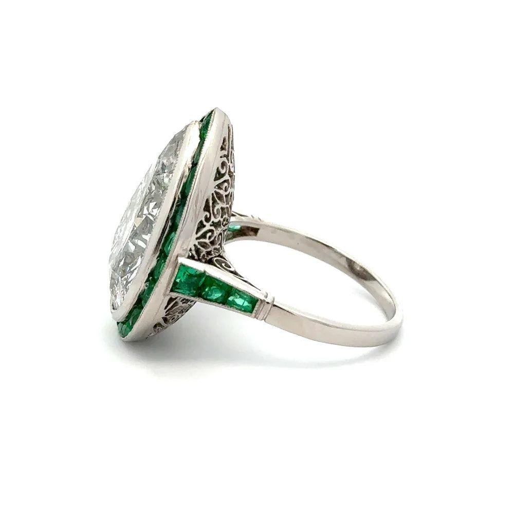 Women's Vintage Show Stopper 9.12 Carat Pear Diamond and Emerald Statement Platinum Ring For Sale