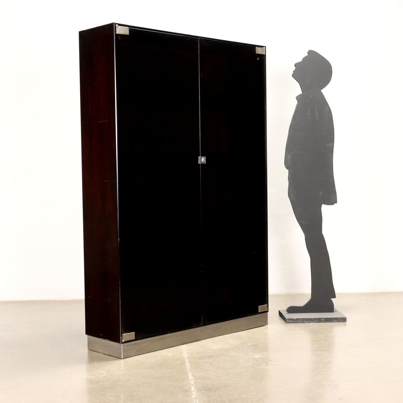 Cabinet with hinged doors in smoked glass and exotic wood veneer, chromed aluminium band.