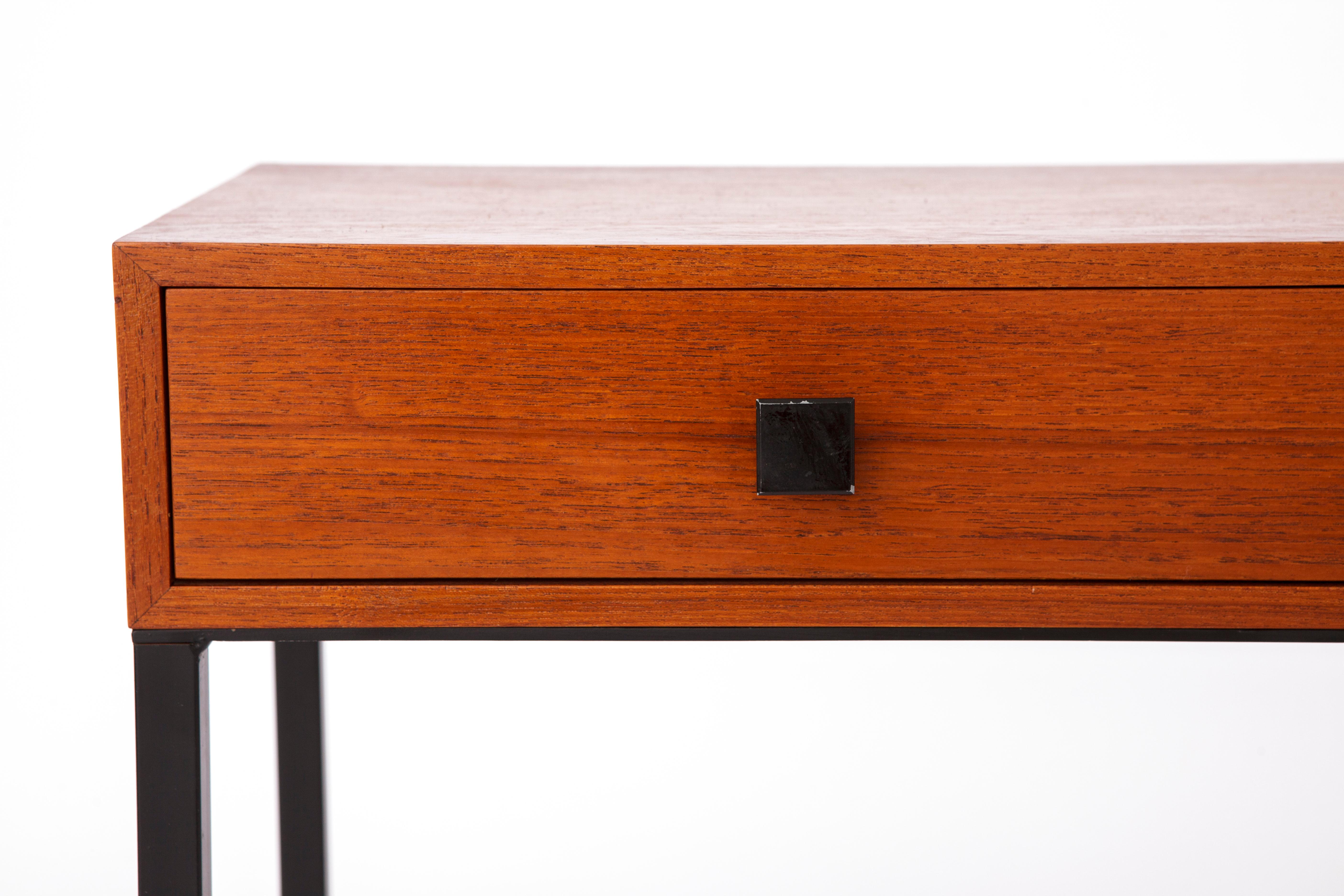 Teak vintage side table with 2 drawers. 
Production period approx. 1960s-1970s. 

Excellent condition. Teak veneer. Metal handles on drawers. 
Surface was polished & oiled. 
No defects. 