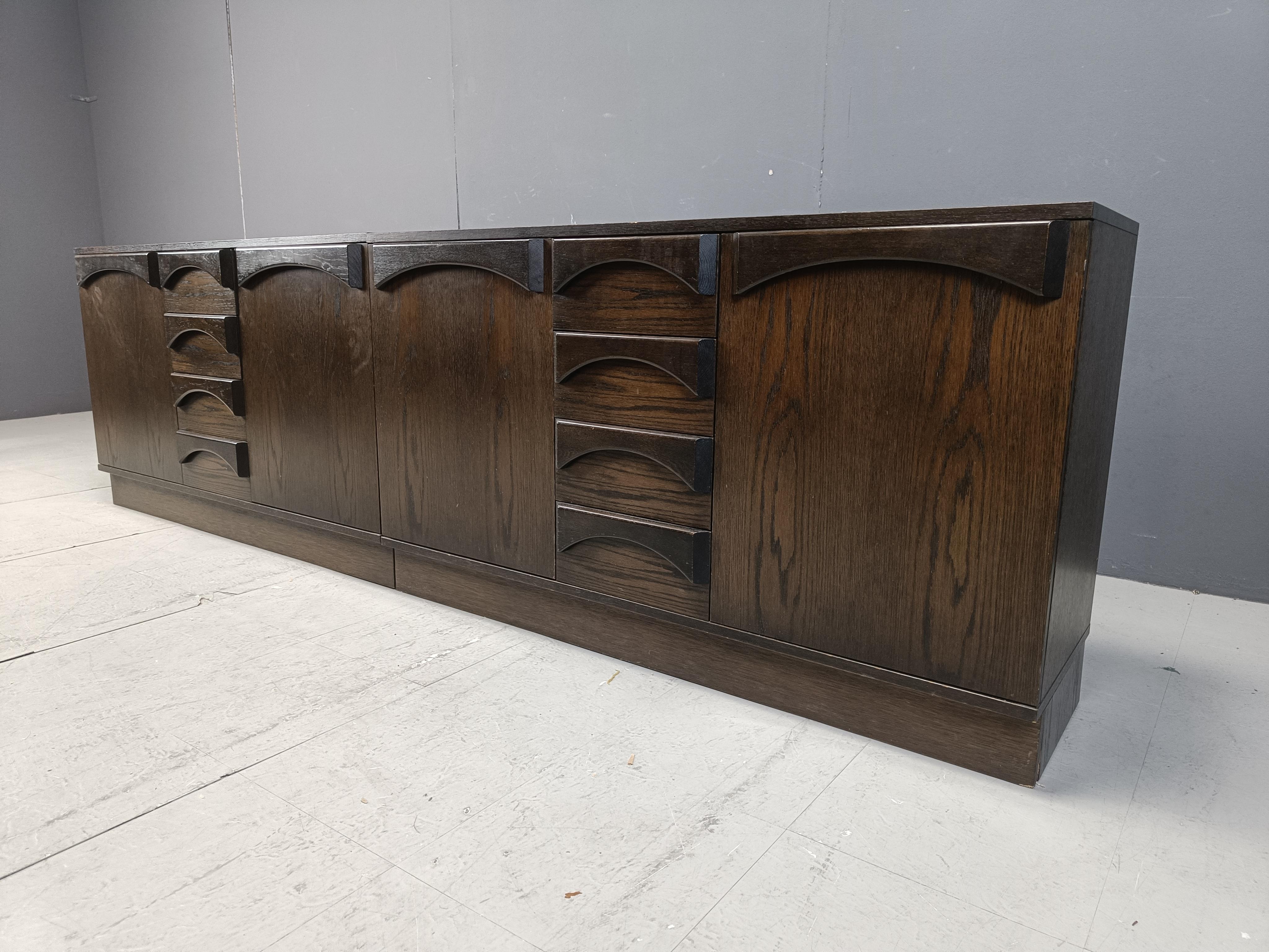 Vintage German sideboard consisting of two parts which each offer two doors and four drawers to provide plenty of storage space.

They can be used as a long sideboard or as separate cabinets.

1970s - Germany

Dimensions:
Height: 70cm
Width 120 +