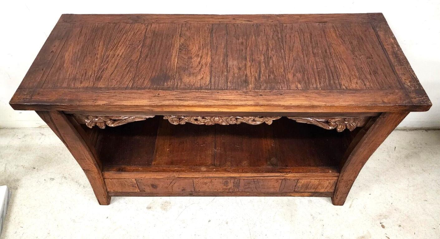 For FULL item description click on CONTINUE READING at the bottom of this page.

Offering one of our recent palm beach estate fine furniture acquisitions of a vintage hand carved mahogany sideboard, buffet, tv, console, or sofa table
with 2